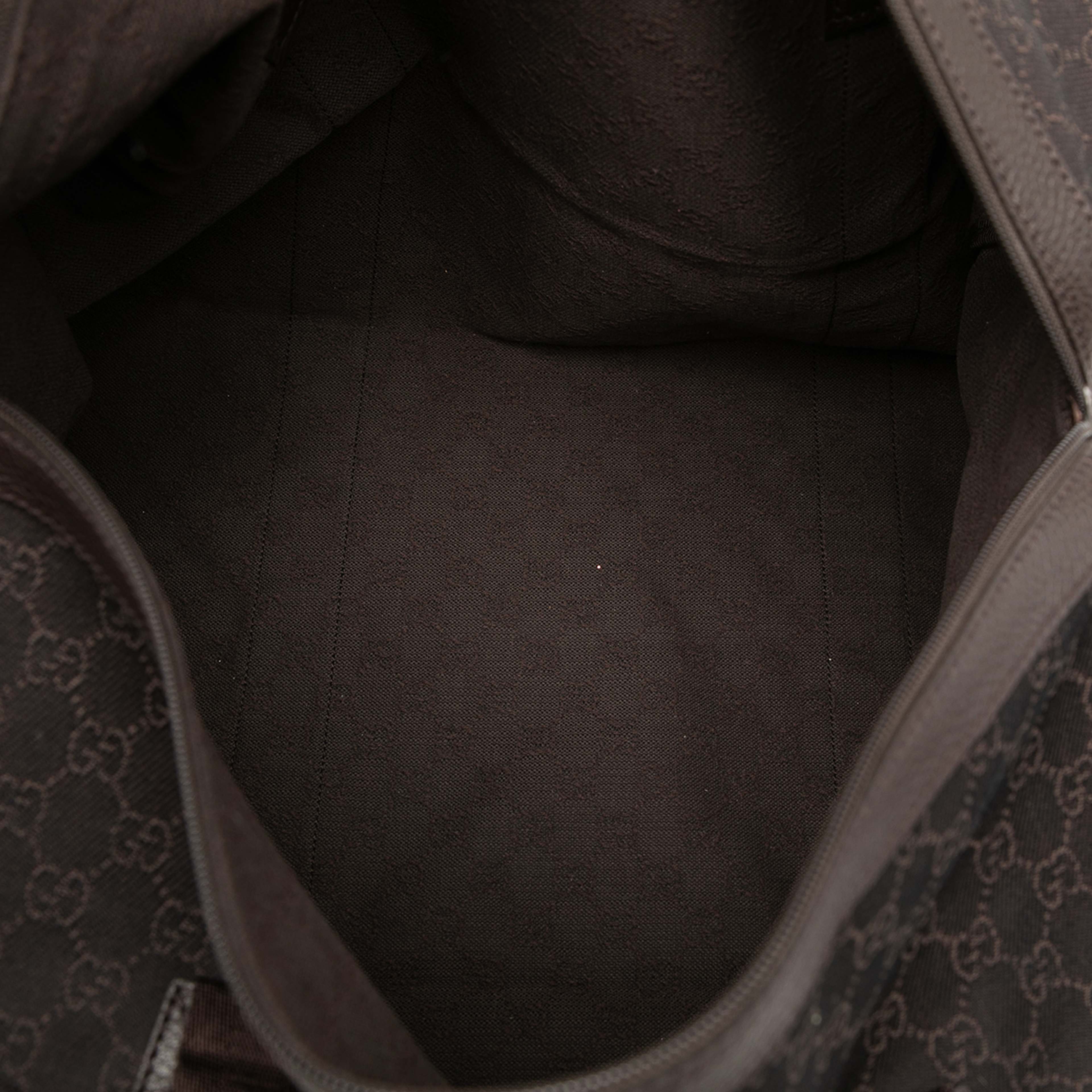 Gucci Gg Canvas Travel Bag, från Luxclusif, i färgen dark brown. Klicka för att öppna bilden i stort format