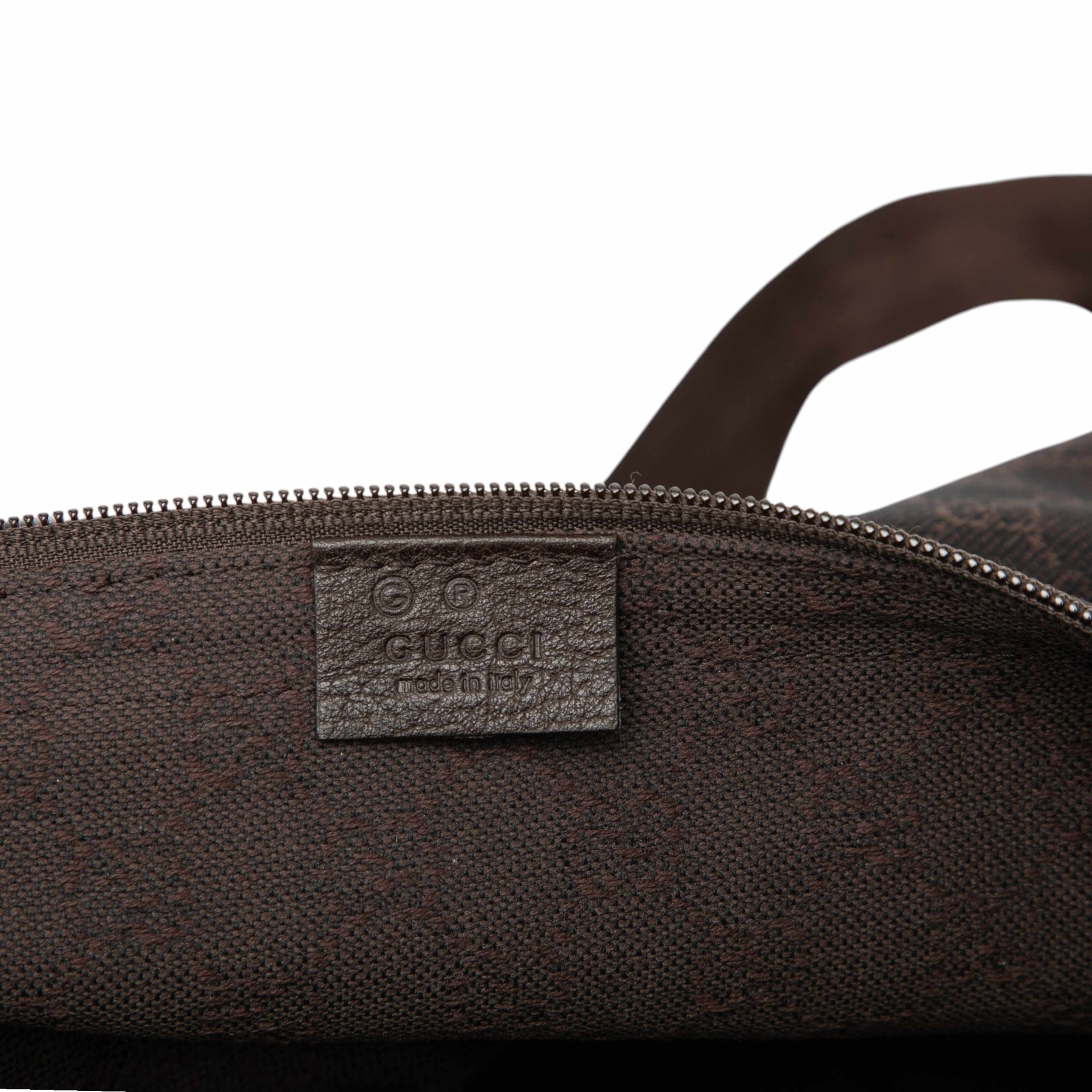 Gucci Gg Canvas Travel Bag, från Luxclusif, i färgen dark brown. Klicka för att öppna bilden i stort format