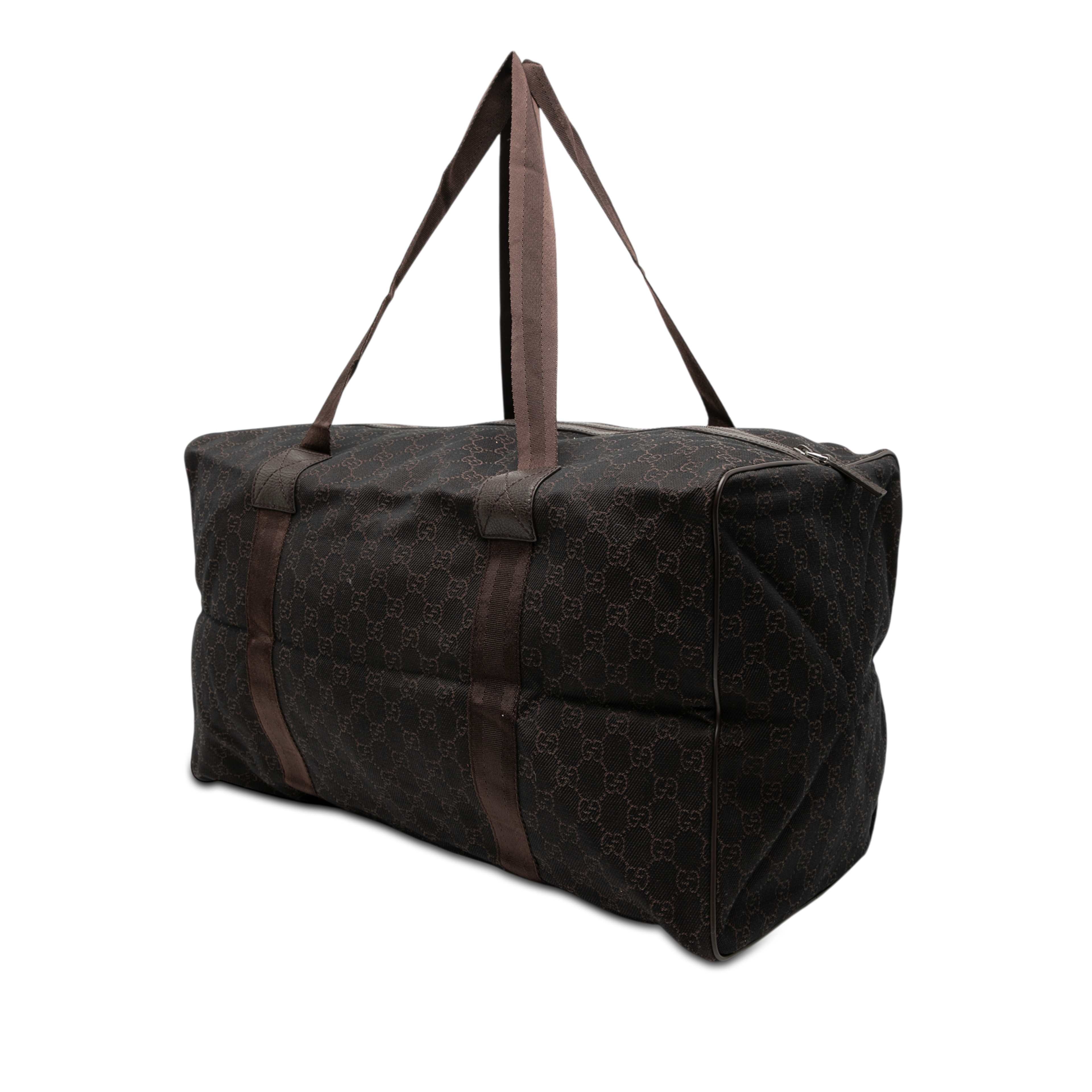 Gucci Gg Canvas Travel Bag, från Luxclusif, i färgen dark brown. Klicka för att öppna bilden i stort format