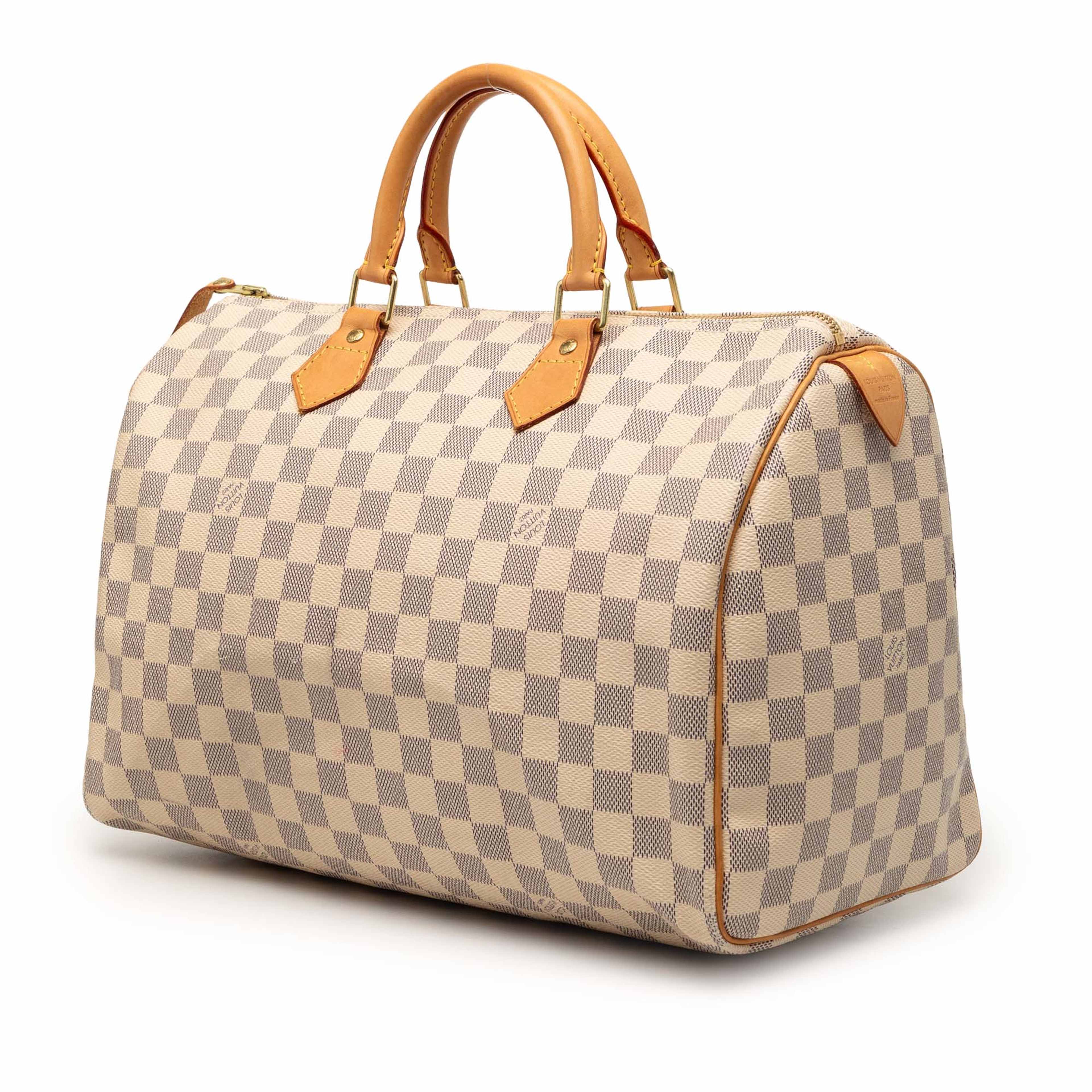 Louis Vuitton Damier Azur Speedy 35, från Luxclusif, i färgen white. Klicka för att öppna bilden i stort format