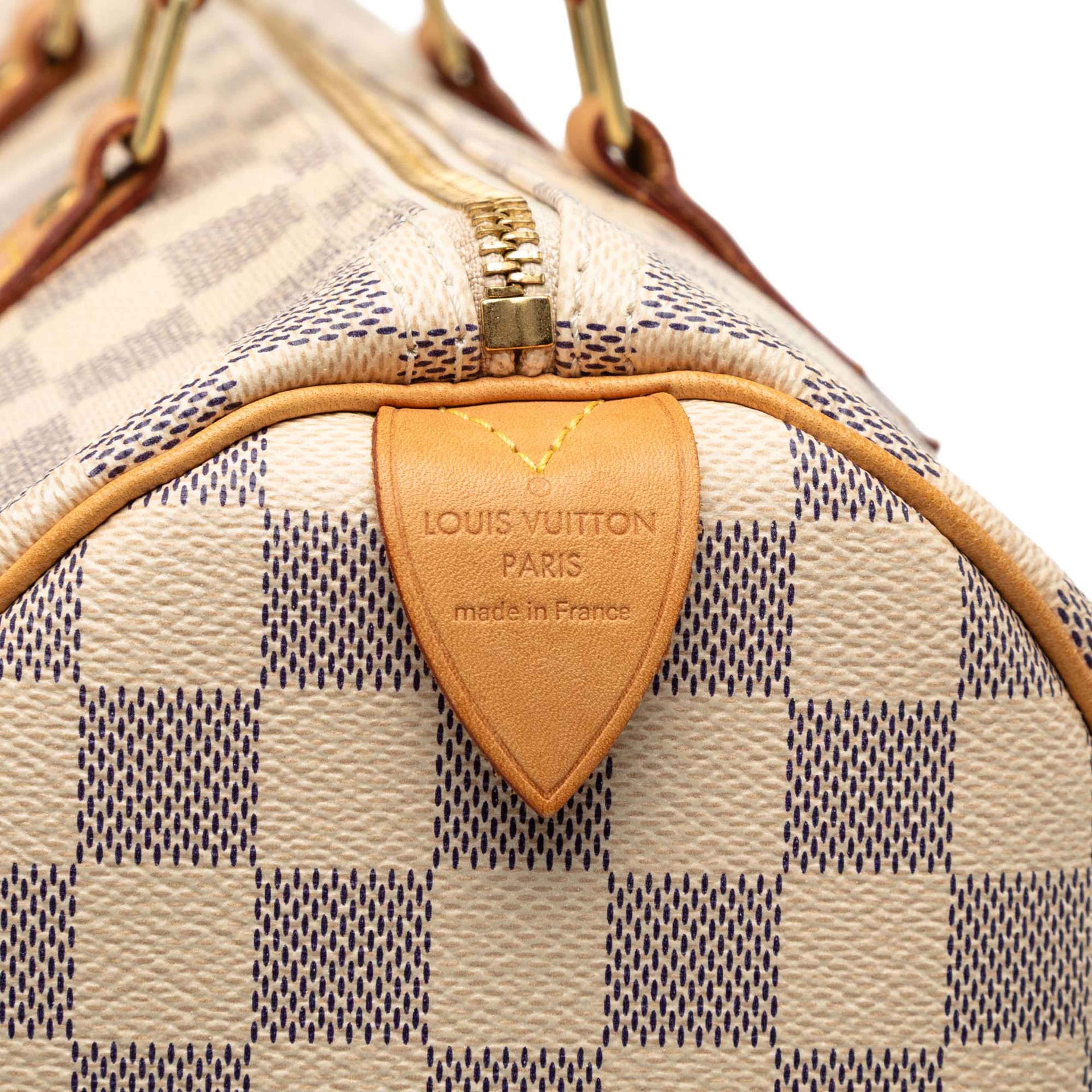 Louis Vuitton Damier Azur Speedy 35, från Luxclusif, i färgen white. Klicka för att öppna bilden i stort format