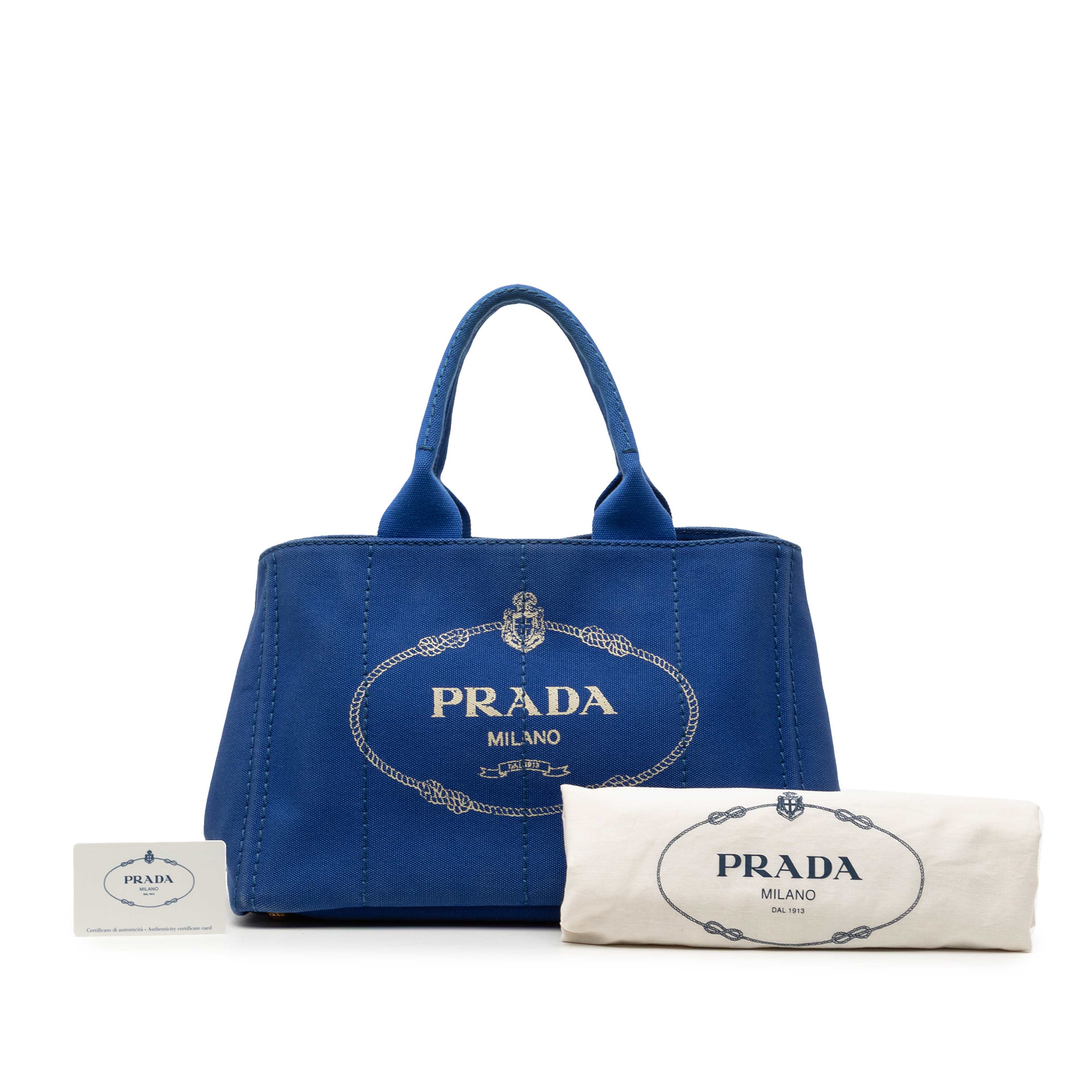 Prada Canvas Canapa Logo Satchel, från Luxclusif, i färgen blå. Klicka för att öppna bilden i stort format
