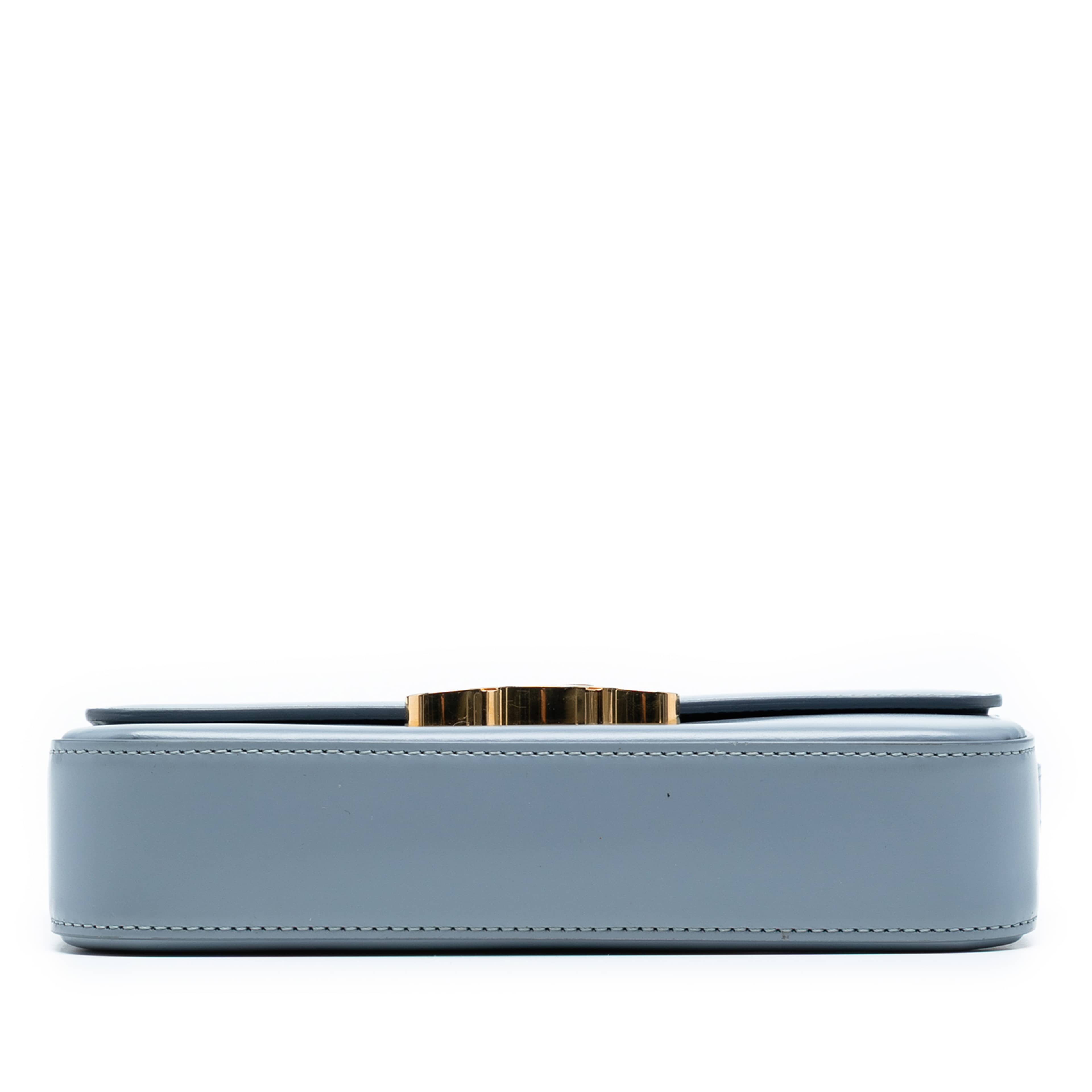 Celine Shiny Calfskin Triomphe Claude Shoulder Bag, från Luxclusif, i färgen light blue. Klicka för att öppna bilden i stort format