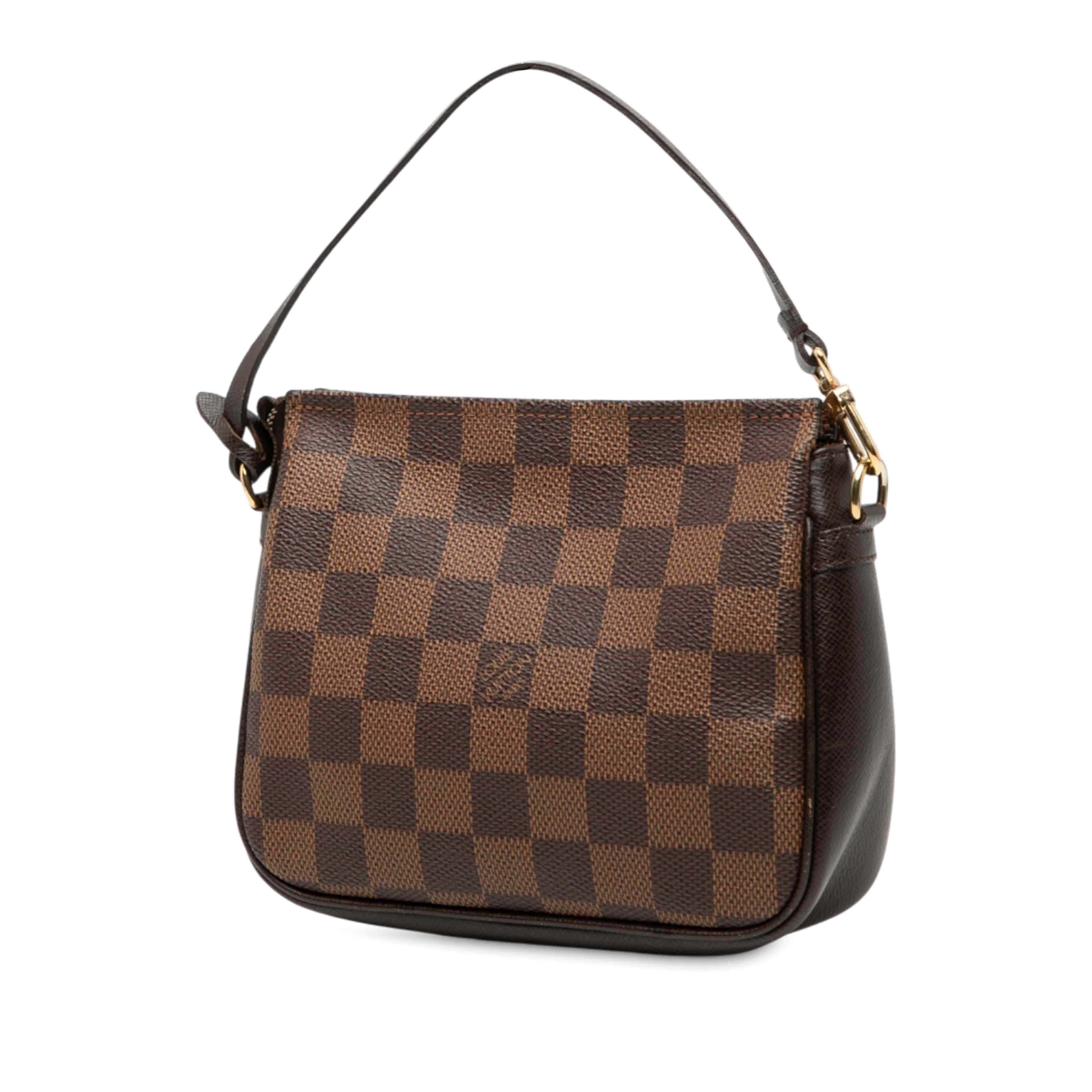 Louis Vuitton Damier Ebene Trousse Pochette, från Luxclusif, i färgen brown. Klicka för att öppna bilden i stort format