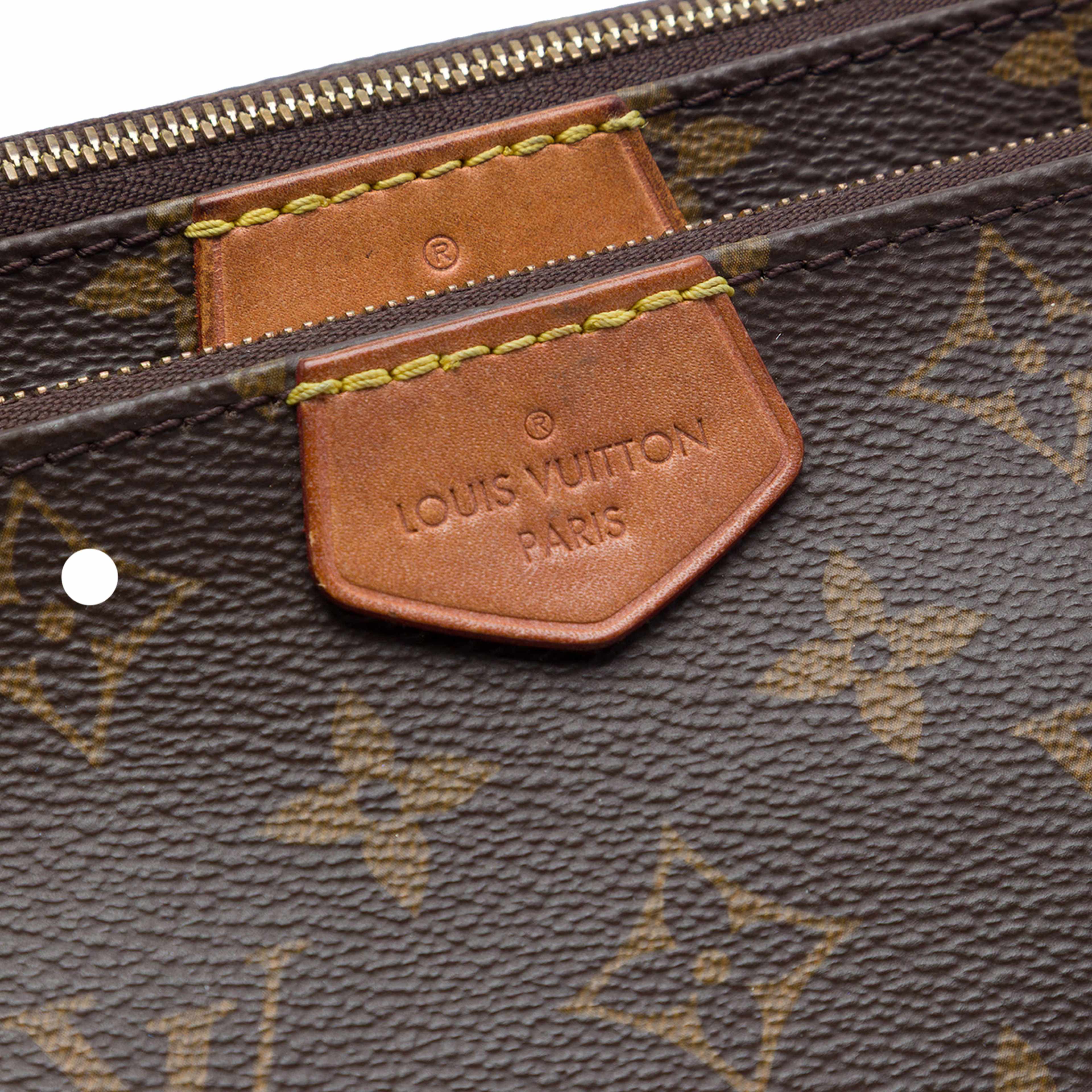 Louis Vuitton Monogram Multi Pochette Accessoires, från Luxclusif, i färgen brun. Klicka för att öppna bilden i stort format