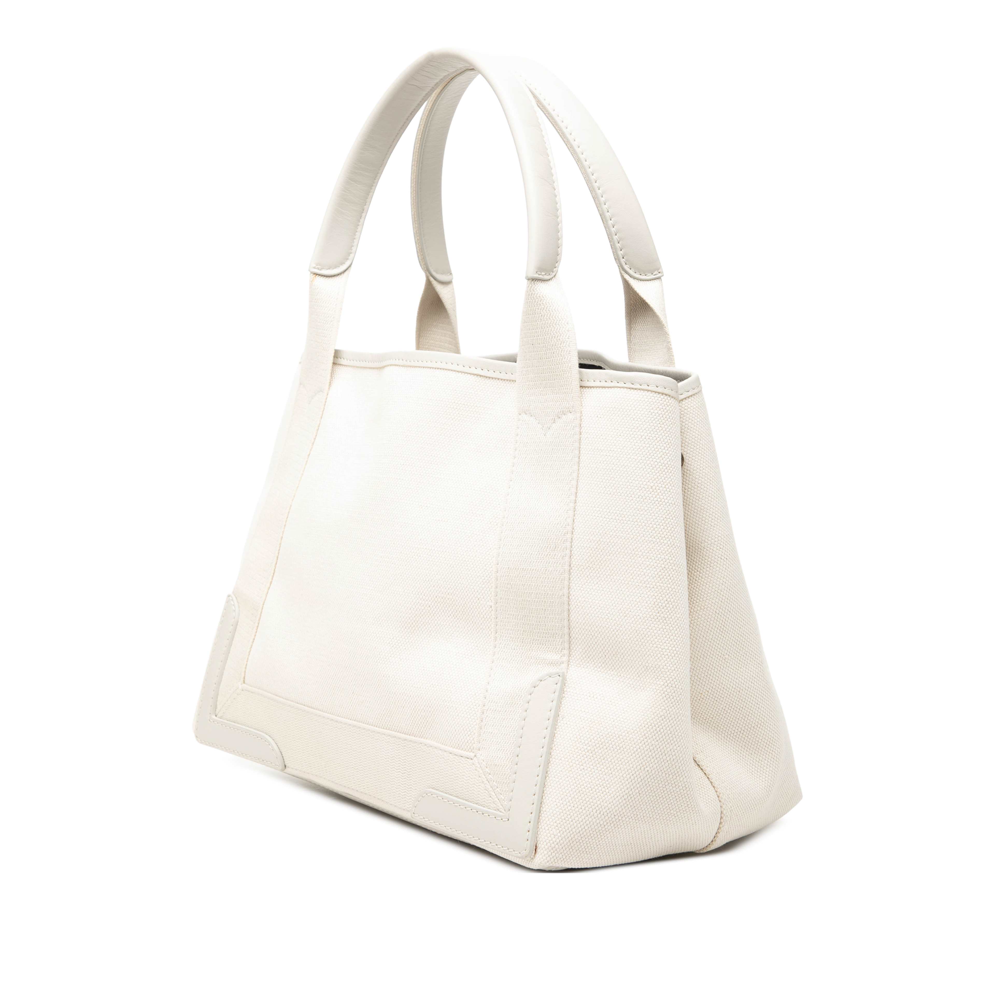 Balenciaga Canvas Navy Cabas Tote S, från Luxclusif, i färgen vit. Klicka för att öppna bilden i stort format
