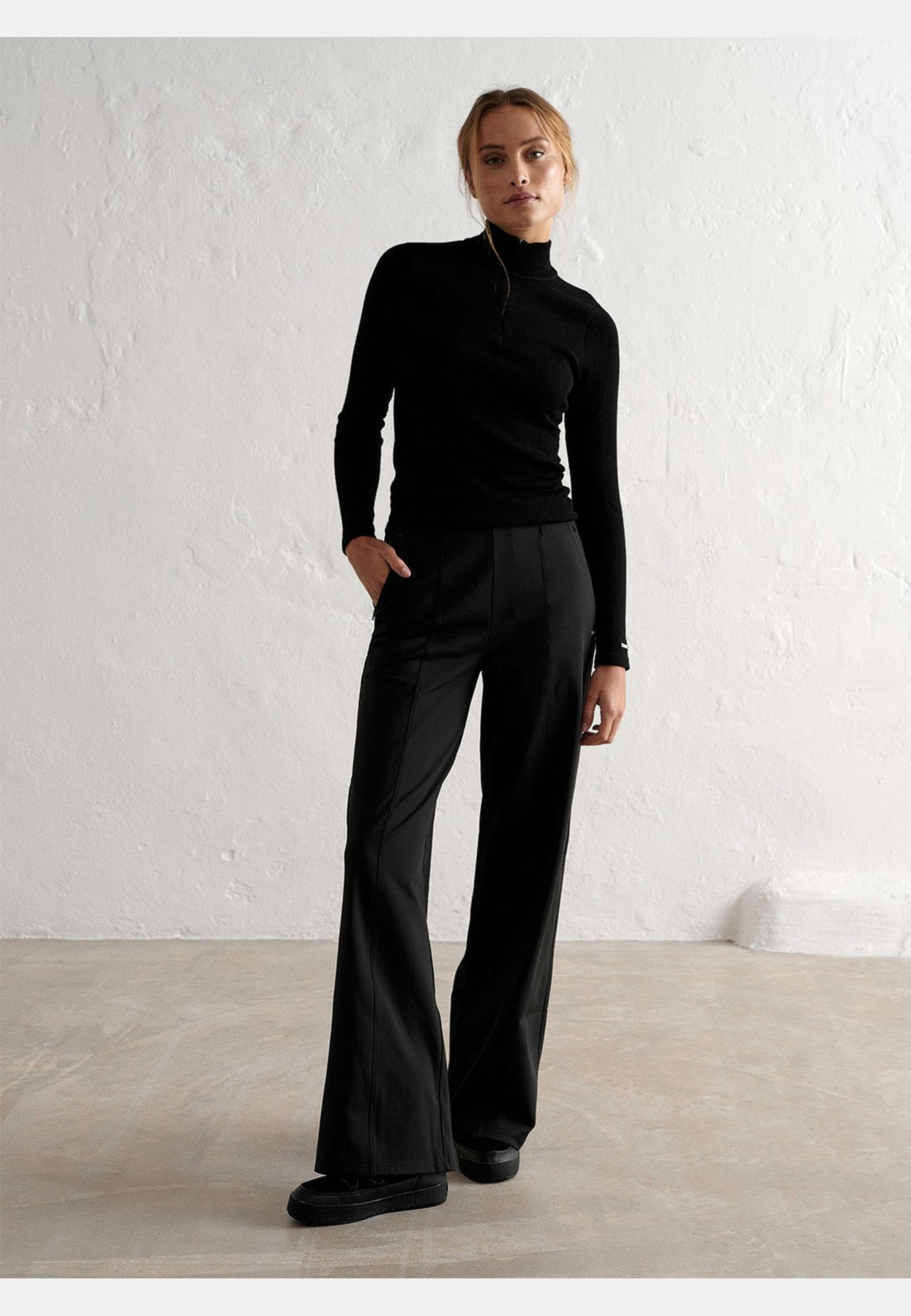 Warming Pintuck Pants, från aim'n, i färgen black. Klicka för att öppna bilden i stort format