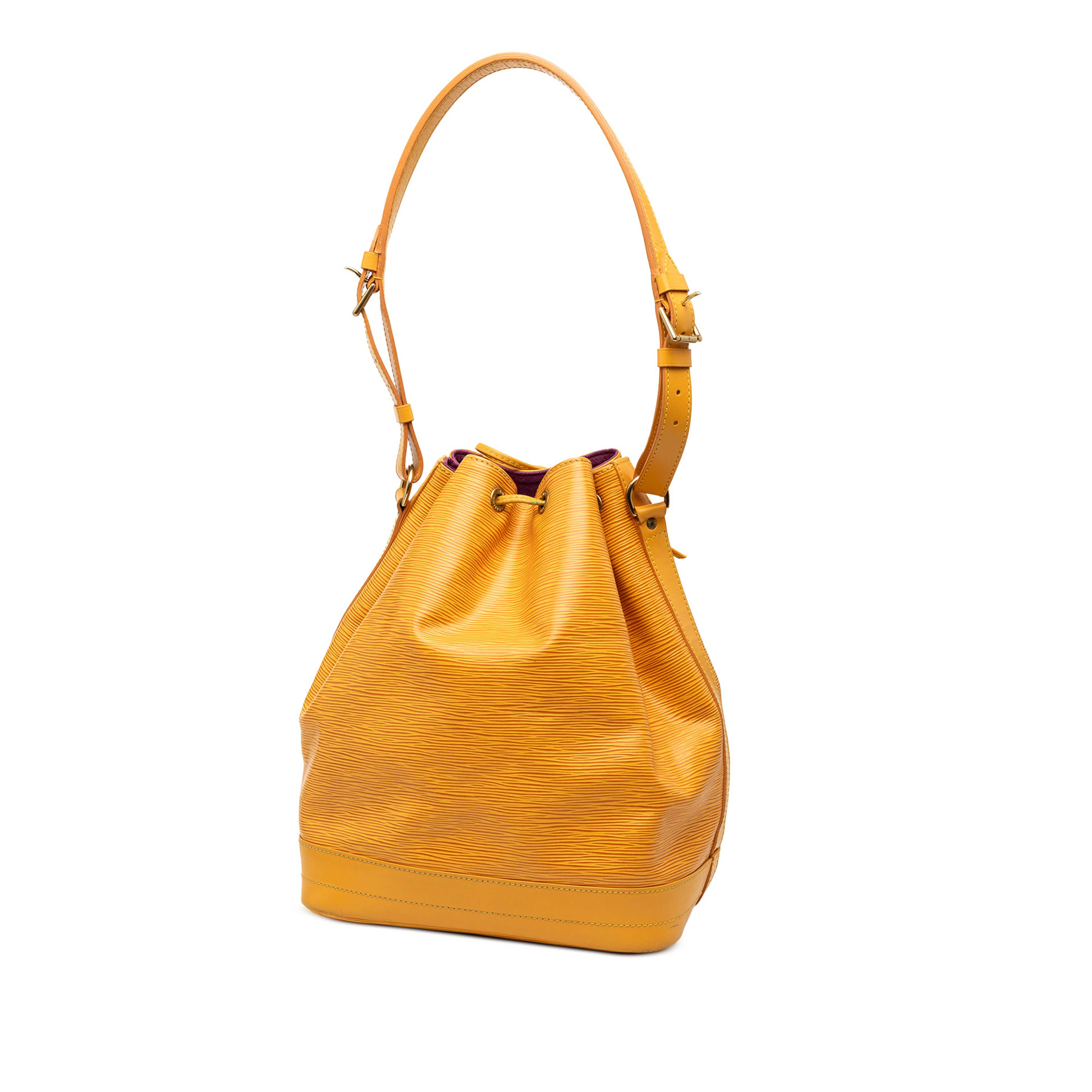 Louis Vuitton Epi Noe Gm, från Luxclusif, i färgen yellow. Klicka för att öppna bilden i stort format