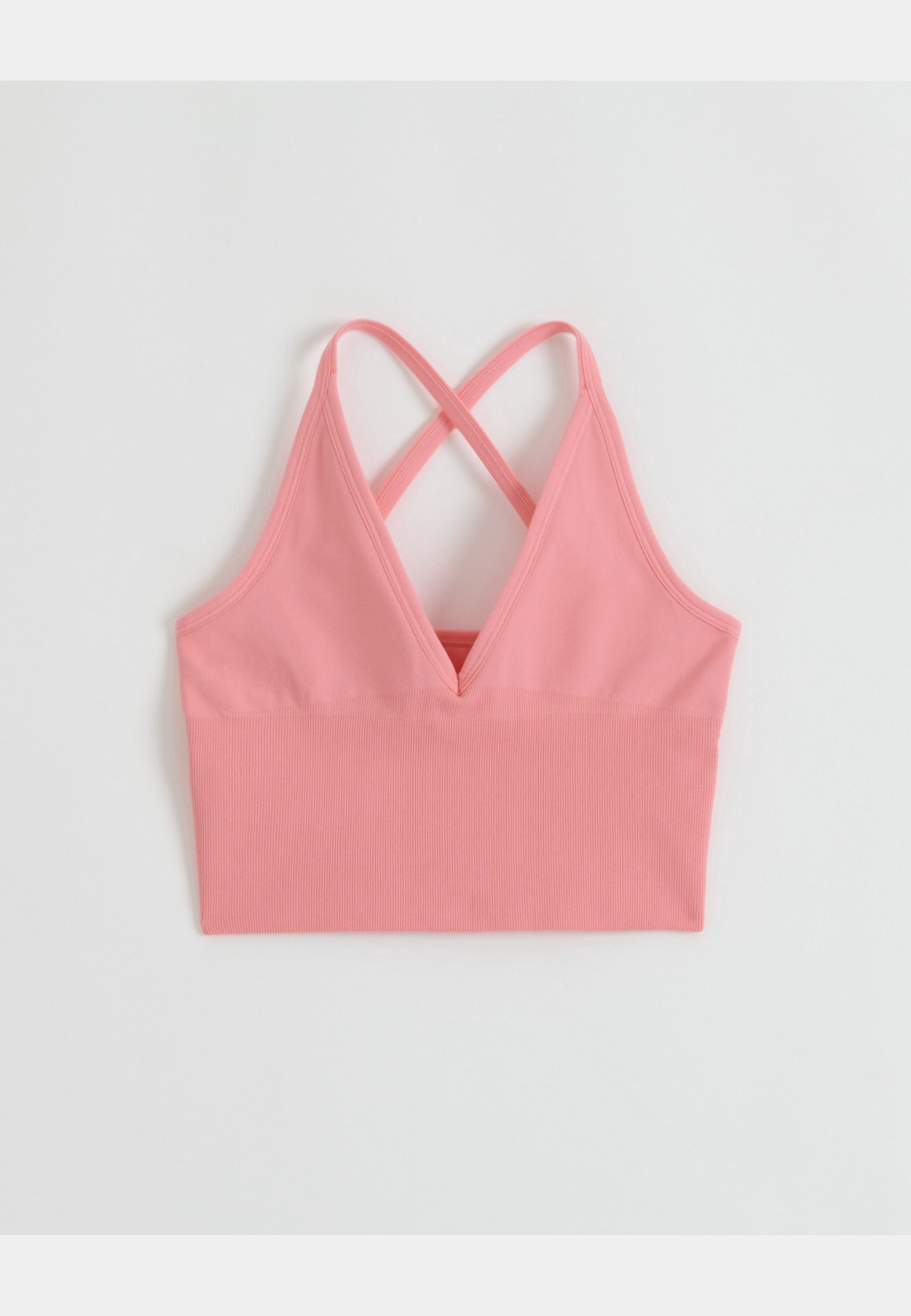 Shape Seamless Cross Back Bralette, från aim'n, i färgen blush. Klicka för att öppna bilden i stort format