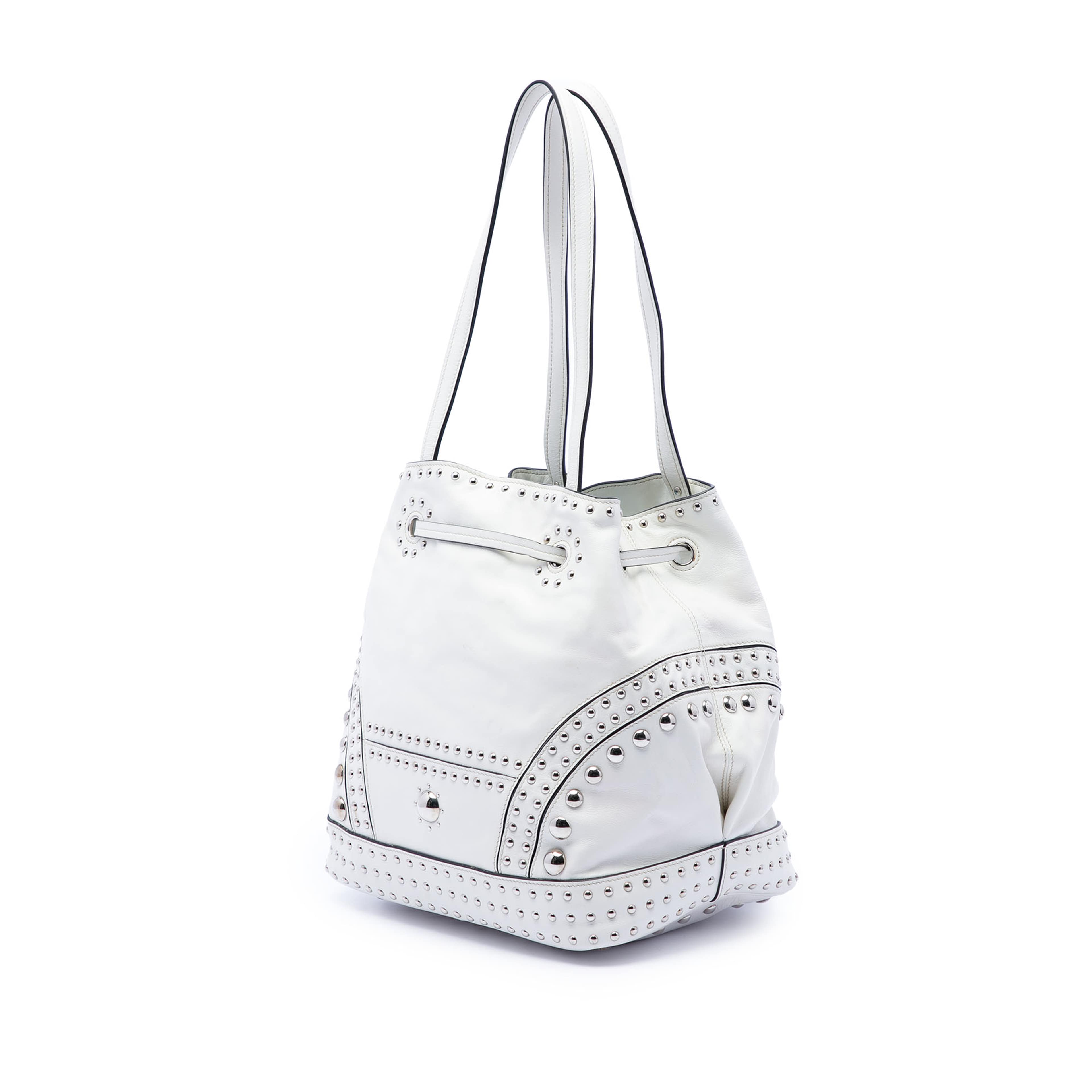 Prada Soft Calf Studded Bucket Bag, från Luxclusif, i färgen vit. Klicka för att öppna bilden i stort format