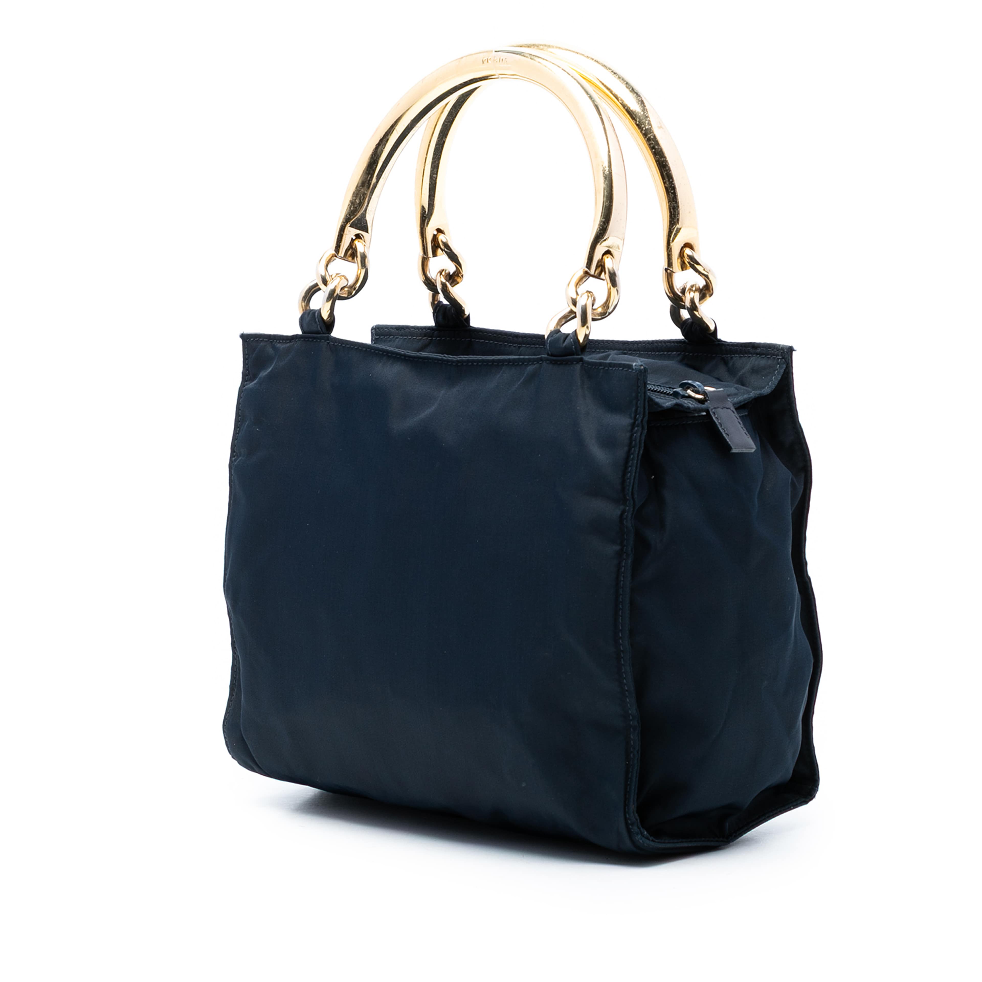 Prada Tessuto Metal Handle Bag, från Luxclusif, i färgen navy. Klicka för att öppna bilden i stort format