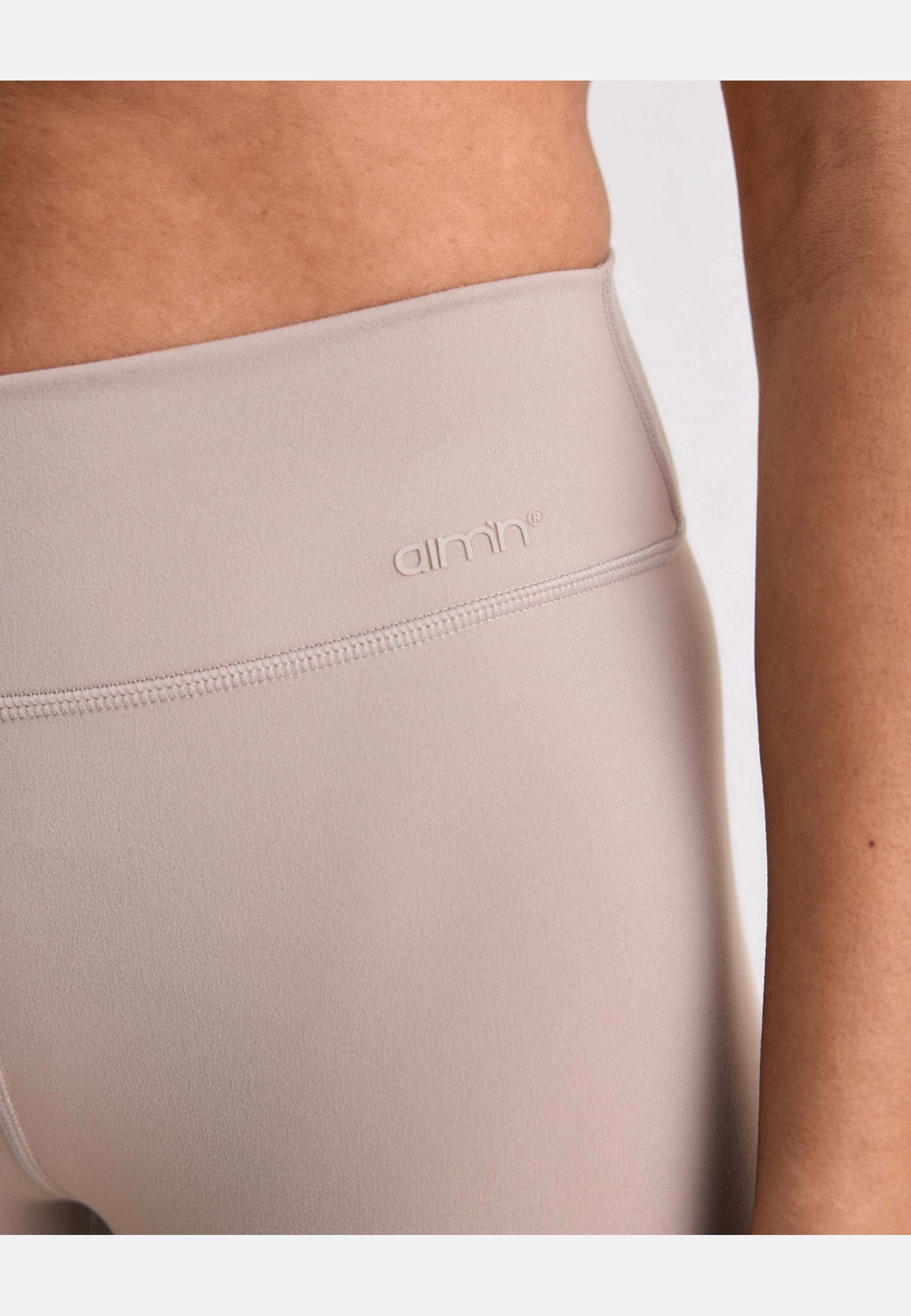 Sense Mid Waist Tights, från aim'n, i färgen dark clay. Klicka för att öppna bilden i stort format
