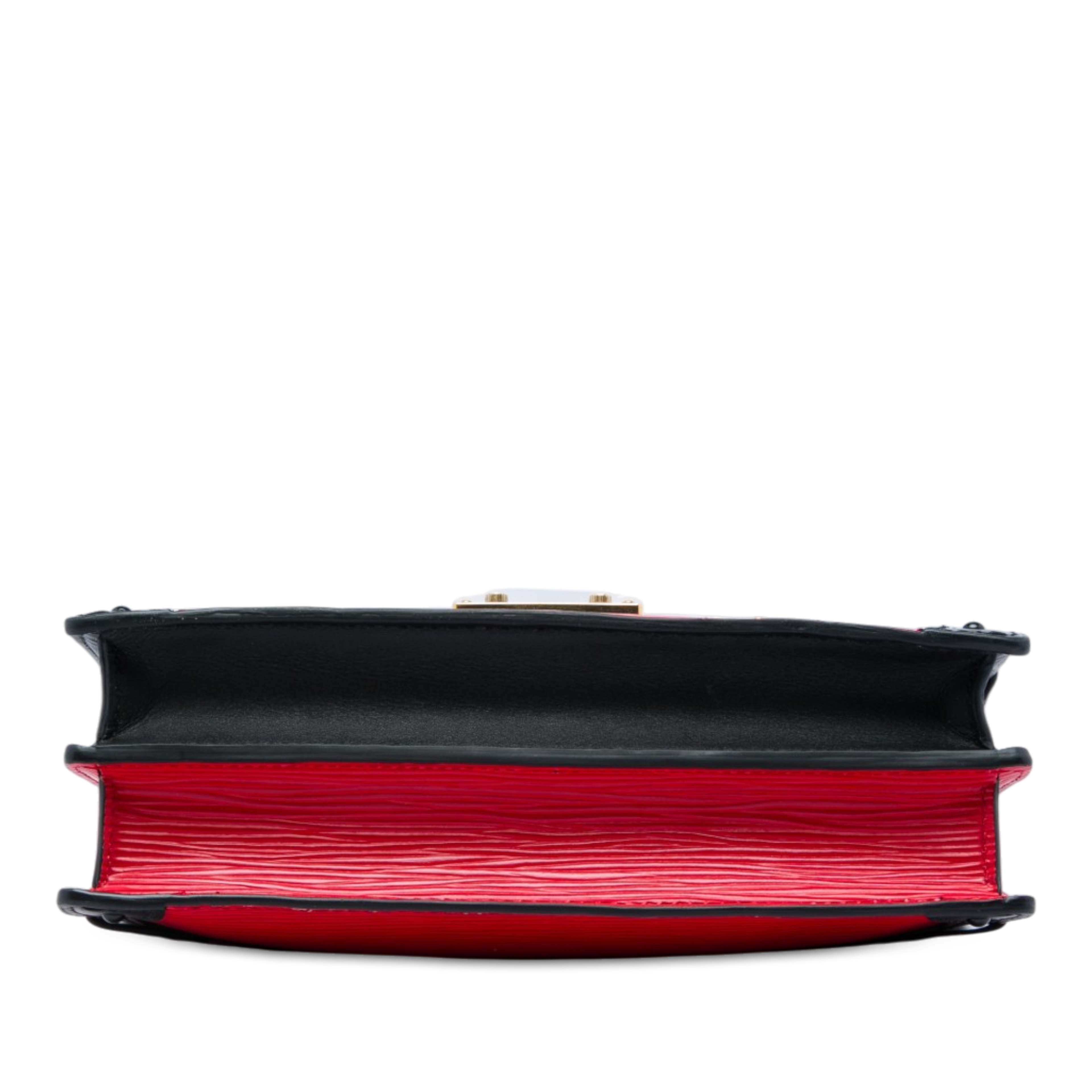 Louis Vuitton Epi Trunk Clutch, från Luxclusif, i färgen röd. Klicka för att öppna bilden i stort format