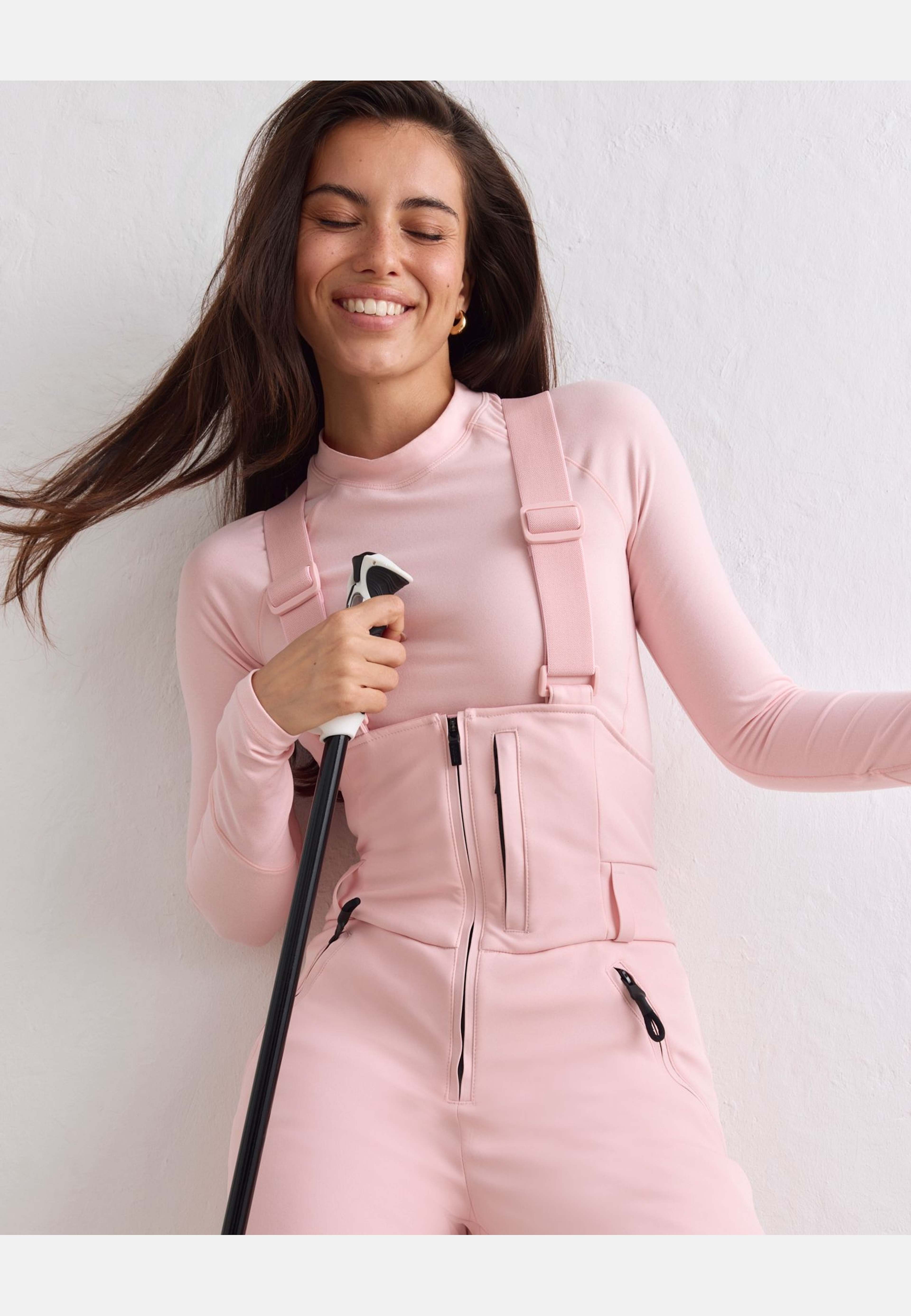 Stretch Thermo Bib Pants, från aim'n, i färgen pink frost. Klicka för att öppna bilden i stort format
