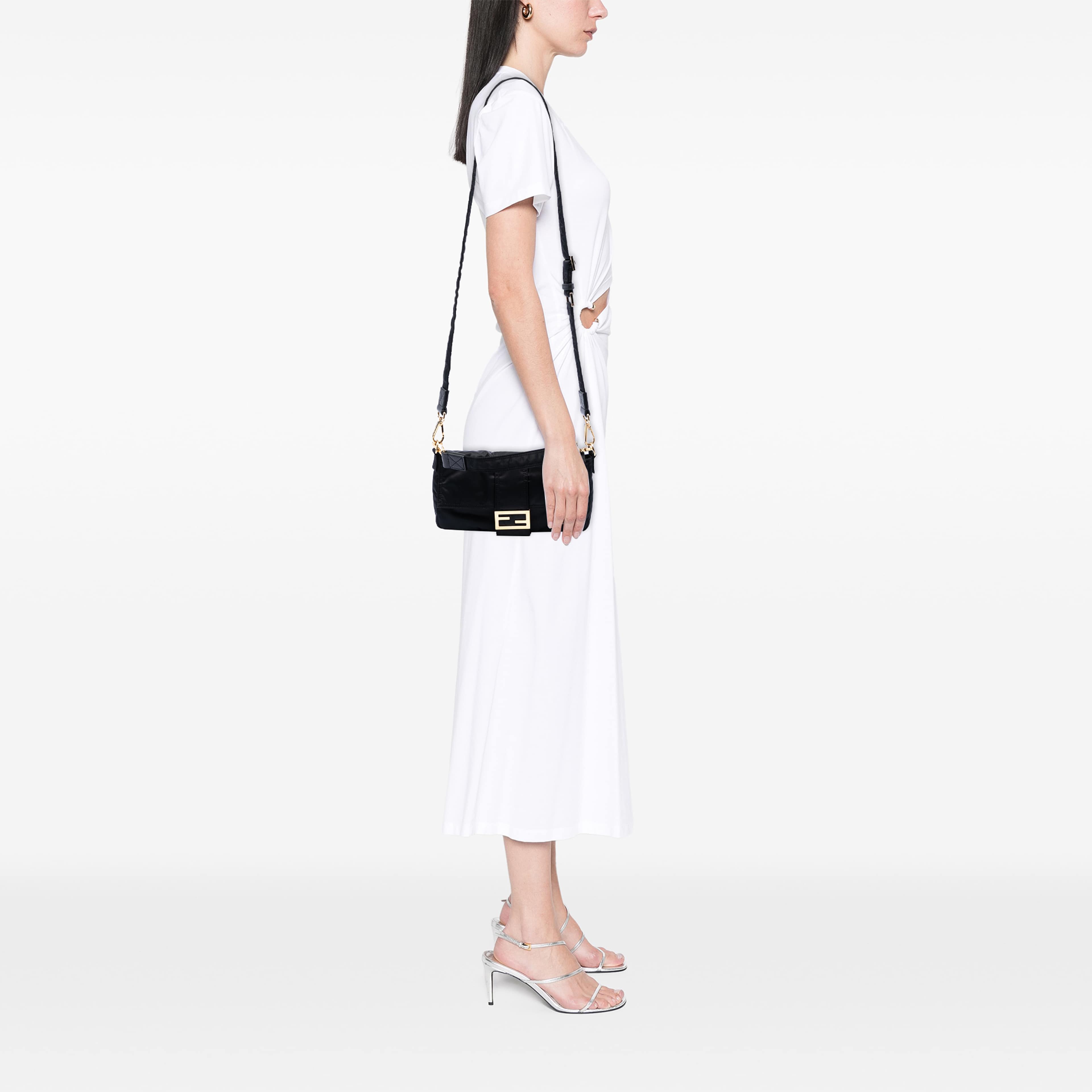 Fendi Porter Yoshida Nylon Convertible Baguette Satchel, från Luxclusif, i färgen svart. Klicka för att öppna bilden i stort format