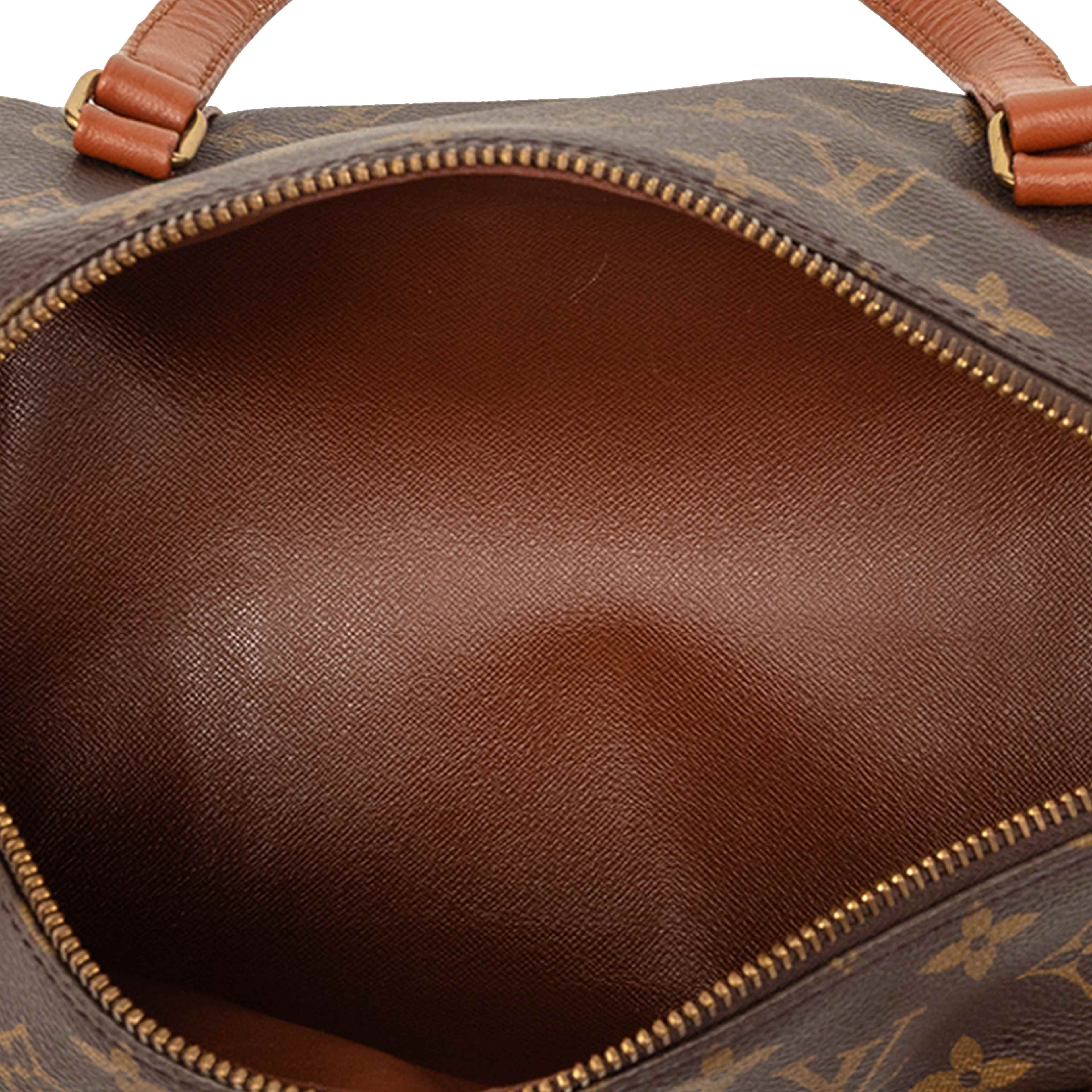 Louis Vuitton Monogram Papillon 30, från Luxclusif, i färgen brun. Klicka för att öppna bilden i stort format
