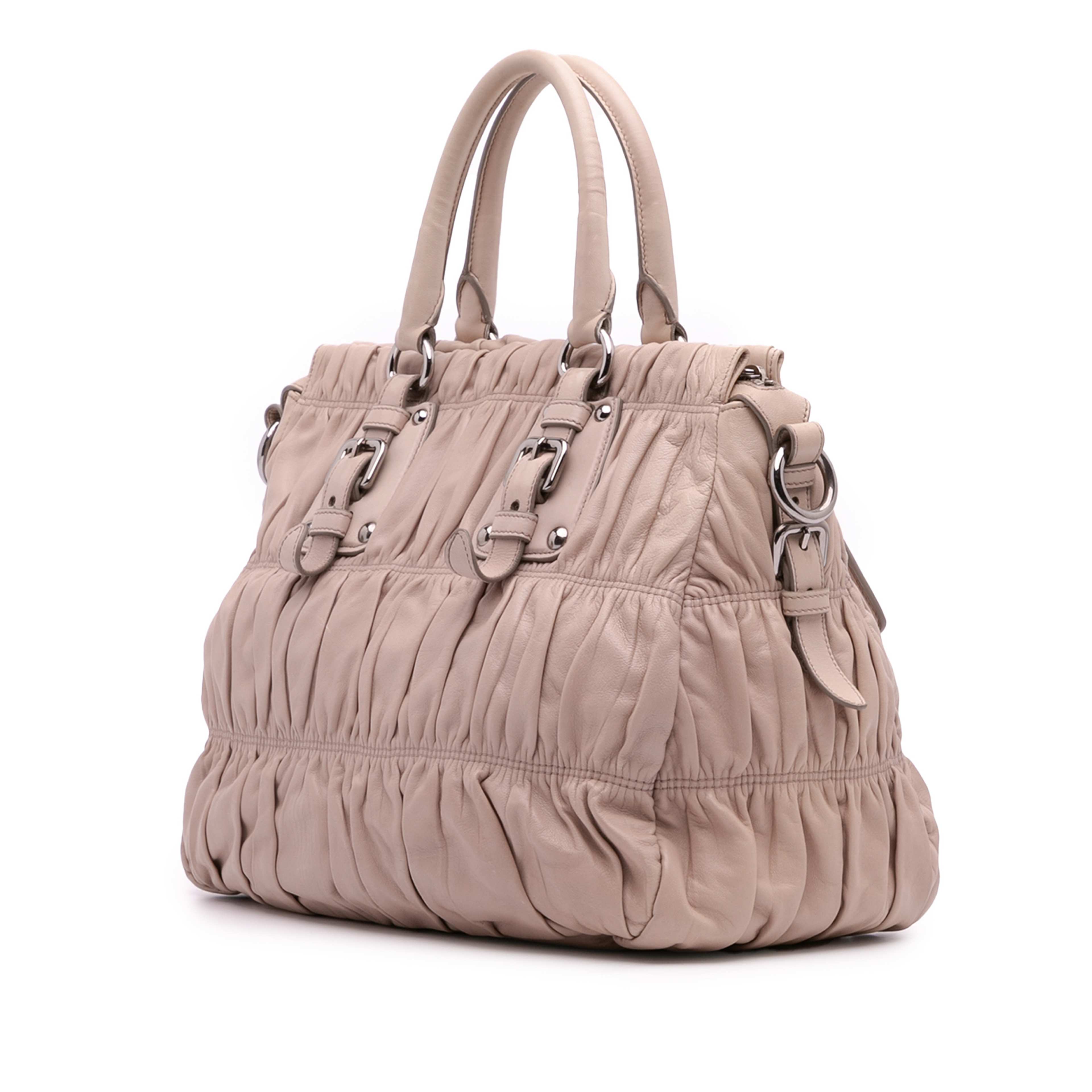 Prada Nappa Gaufre Satchel, från Luxclusif, i färgen brun. Klicka för att öppna bilden i stort format