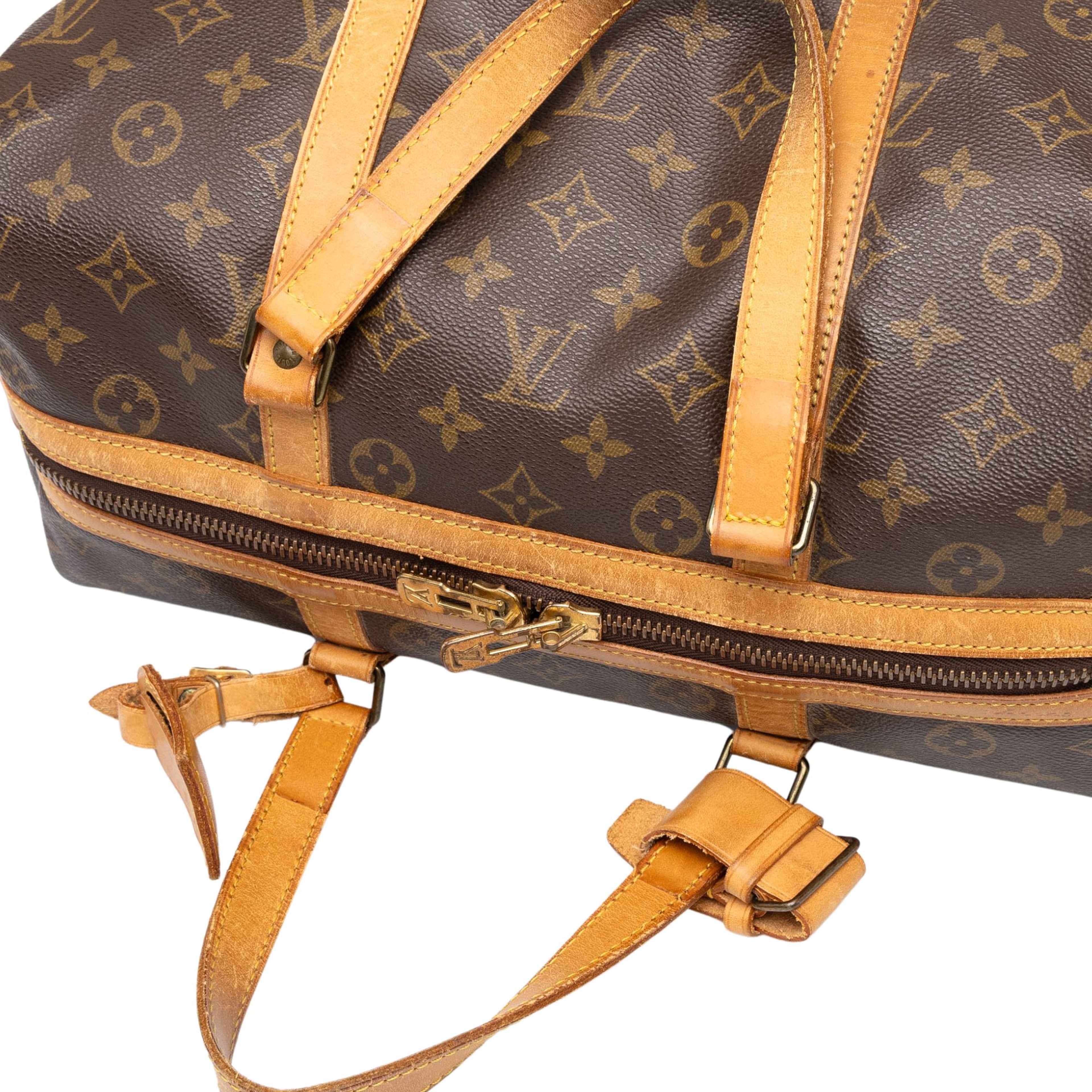 Louis Vuitton Monogram Sac Souple 35, från Luxclusif, i färgen brun. Klicka för att öppna bilden i stort format