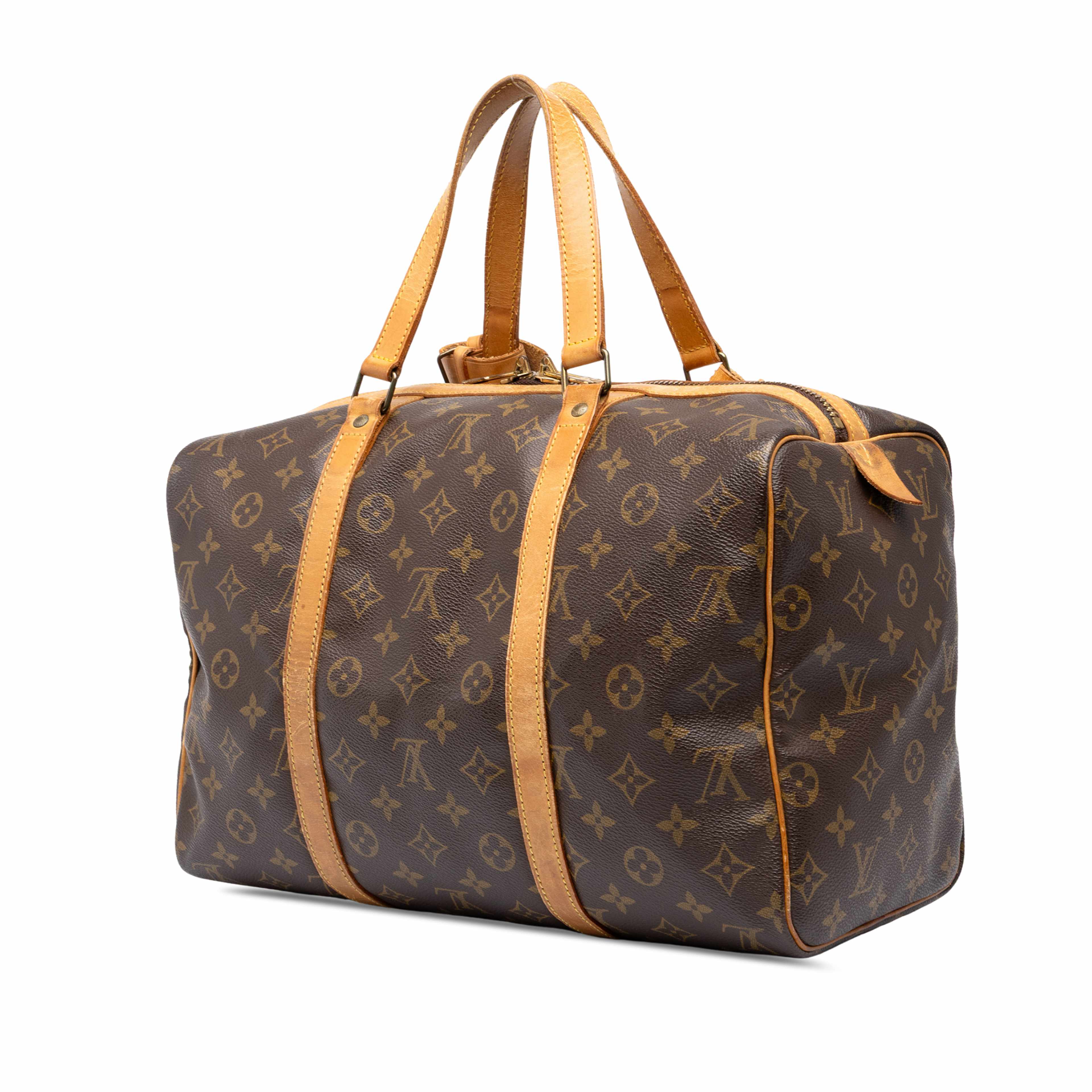 Louis Vuitton Monogram Sac Souple 35, från Luxclusif, i färgen brun. Klicka för att öppna bilden i stort format