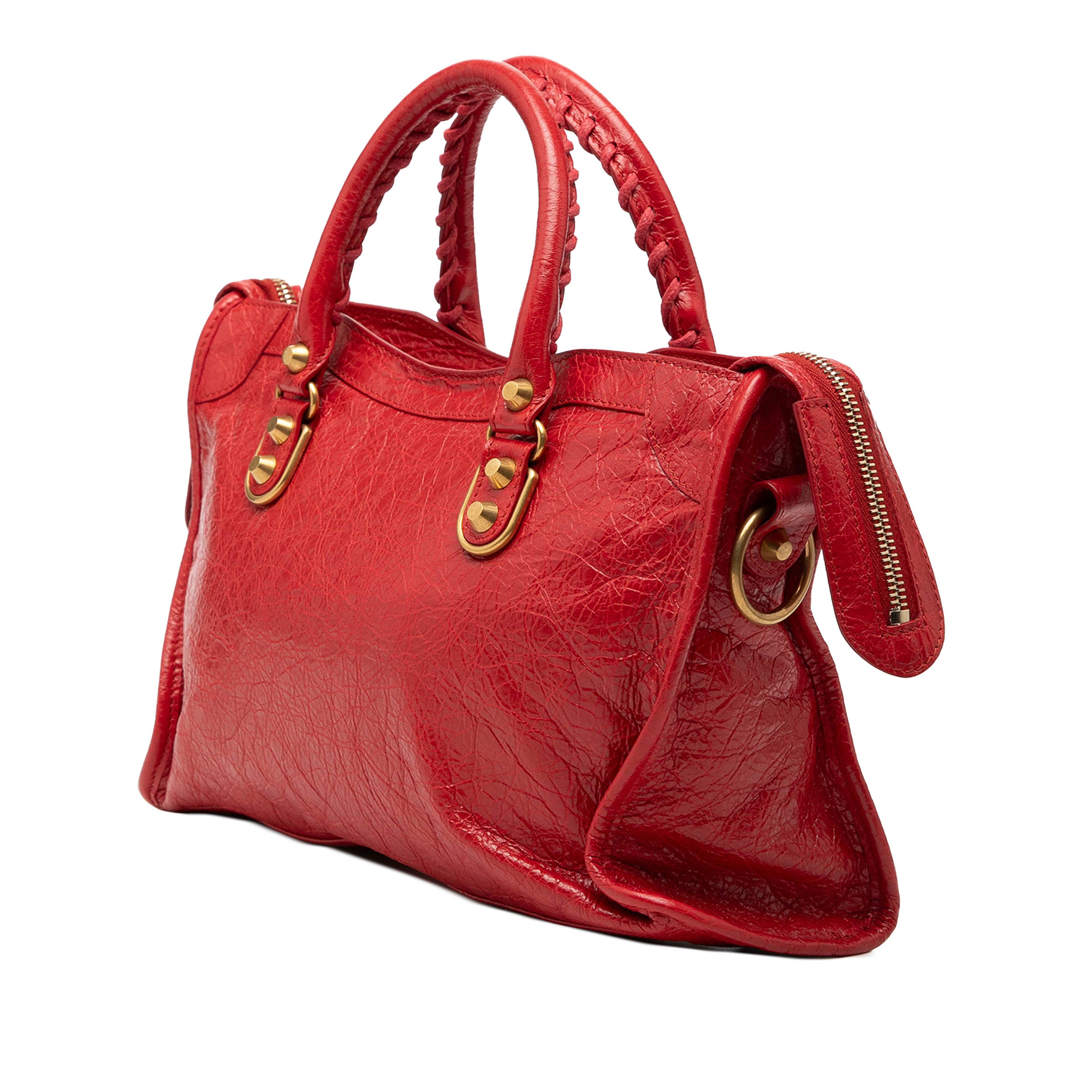 Balenciaga Small Lambskin Motocross Classic Metallic Edge City Satchel, från Luxclusif, i färgen red. Klicka för att öppna bilden i stort format