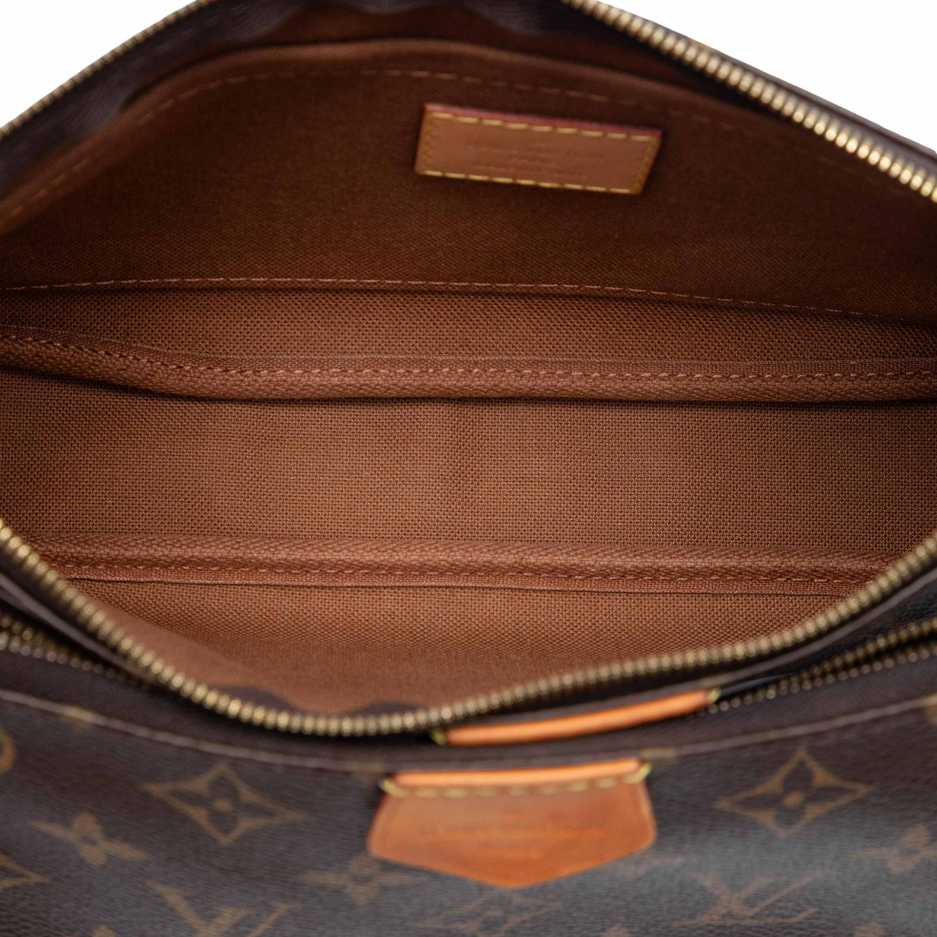 Louis Vuitton Monogram Multi Pochette Accessoires, från Luxclusif, i färgen brown. Klicka för att öppna bilden i stort format