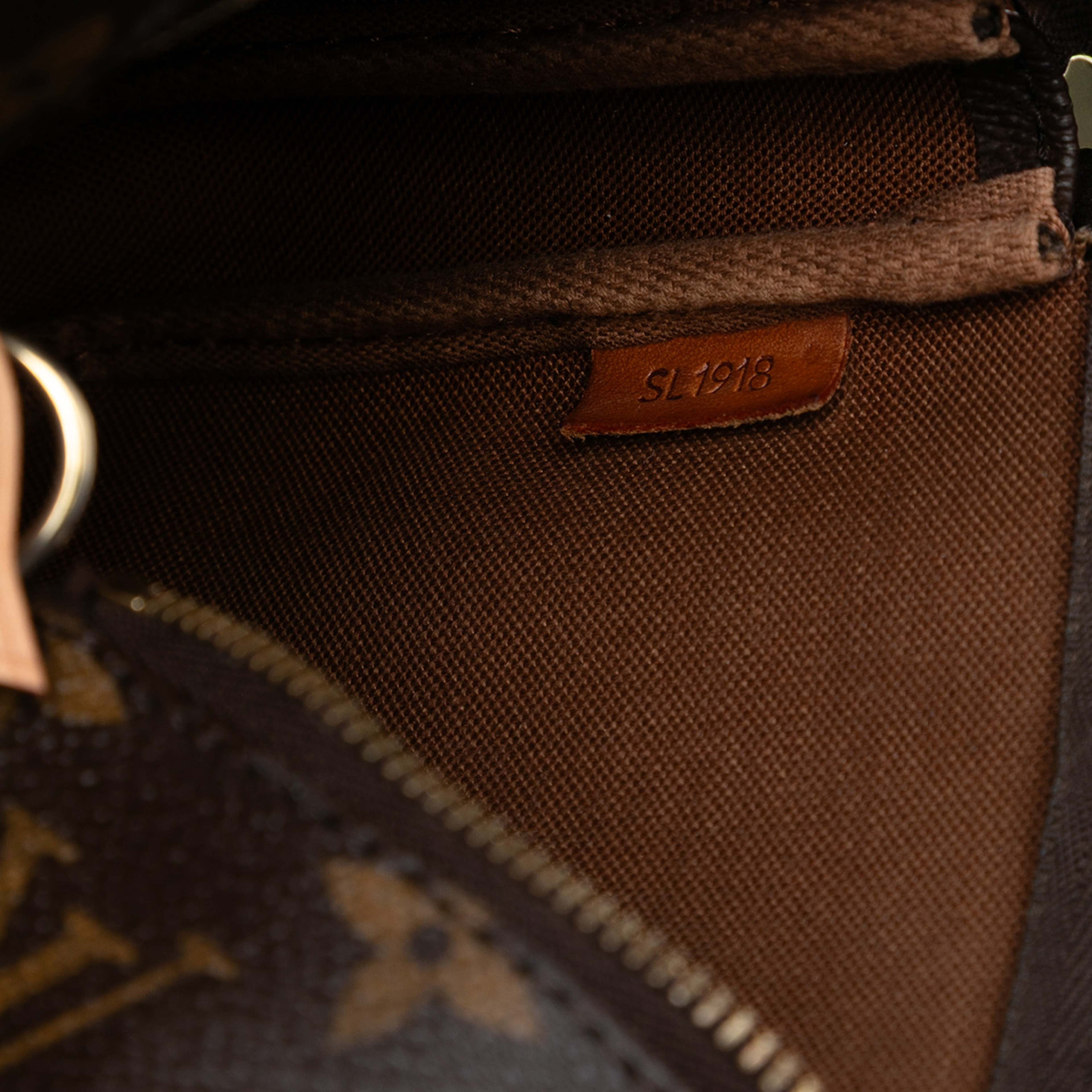 Louis Vuitton Monogram Pochette Accessoires, från Luxclusif, i färgen brown. Klicka för att öppna bilden i stort format