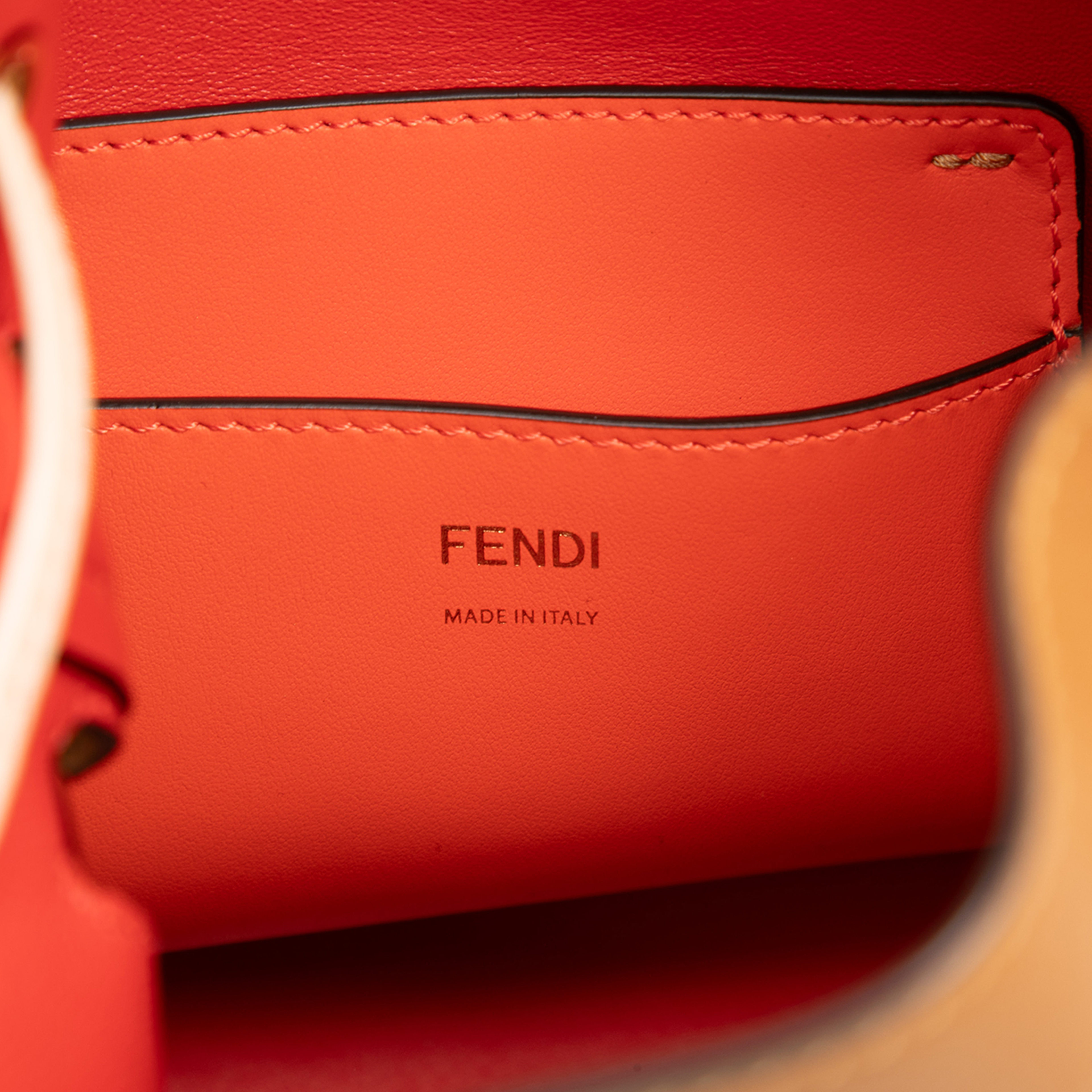 Fendi Small Perforated Leather Mon Tresor Bucket Bag, från Luxclusif, i färgen camel. Klicka för att öppna bilden i stort format