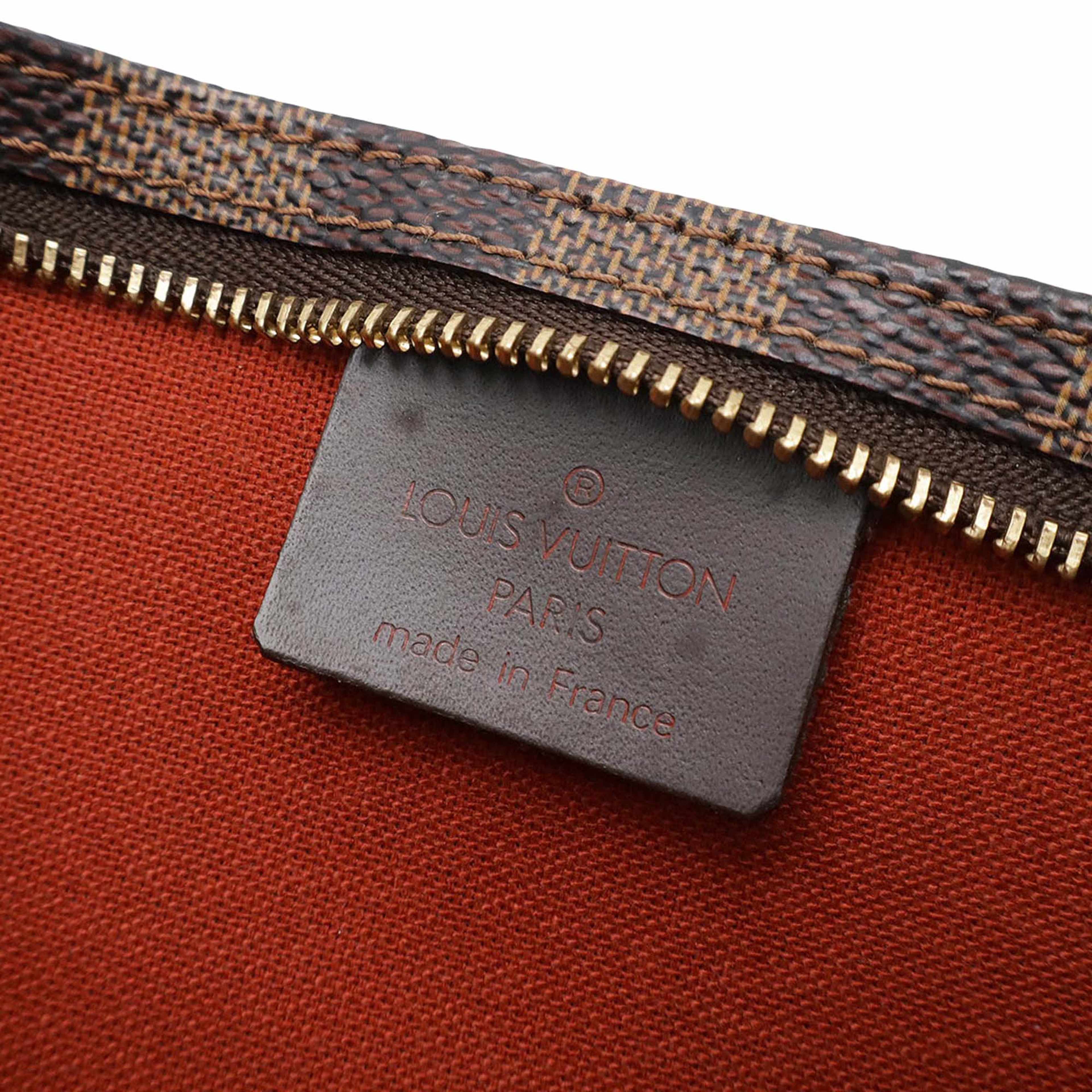Louis Vuitton Damier Ebene Navona, från Luxclusif, i färgen brun. Klicka för att öppna bilden i stort format