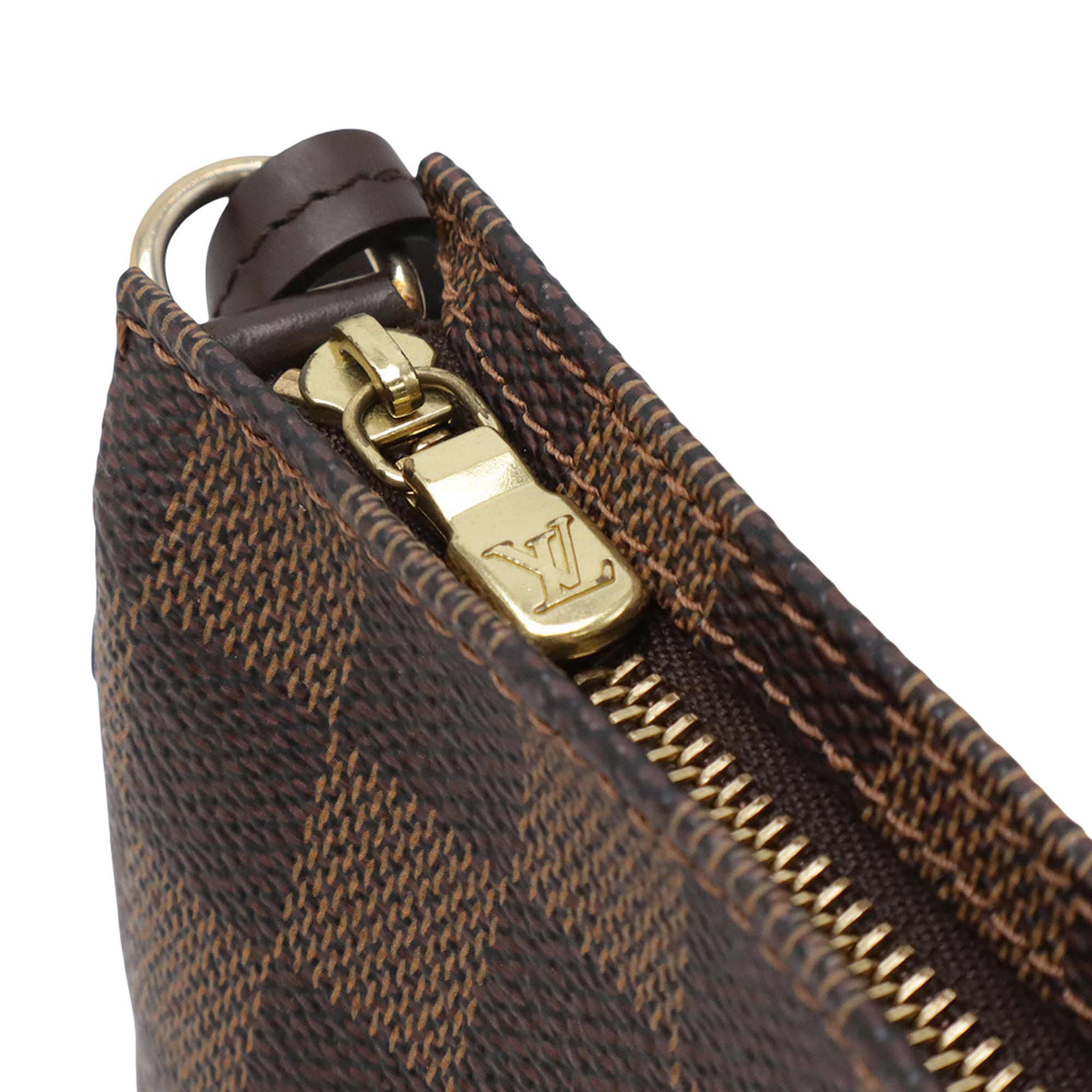Louis Vuitton Damier Ebene Navona, från Luxclusif, i färgen brun. Klicka för att öppna bilden i stort format