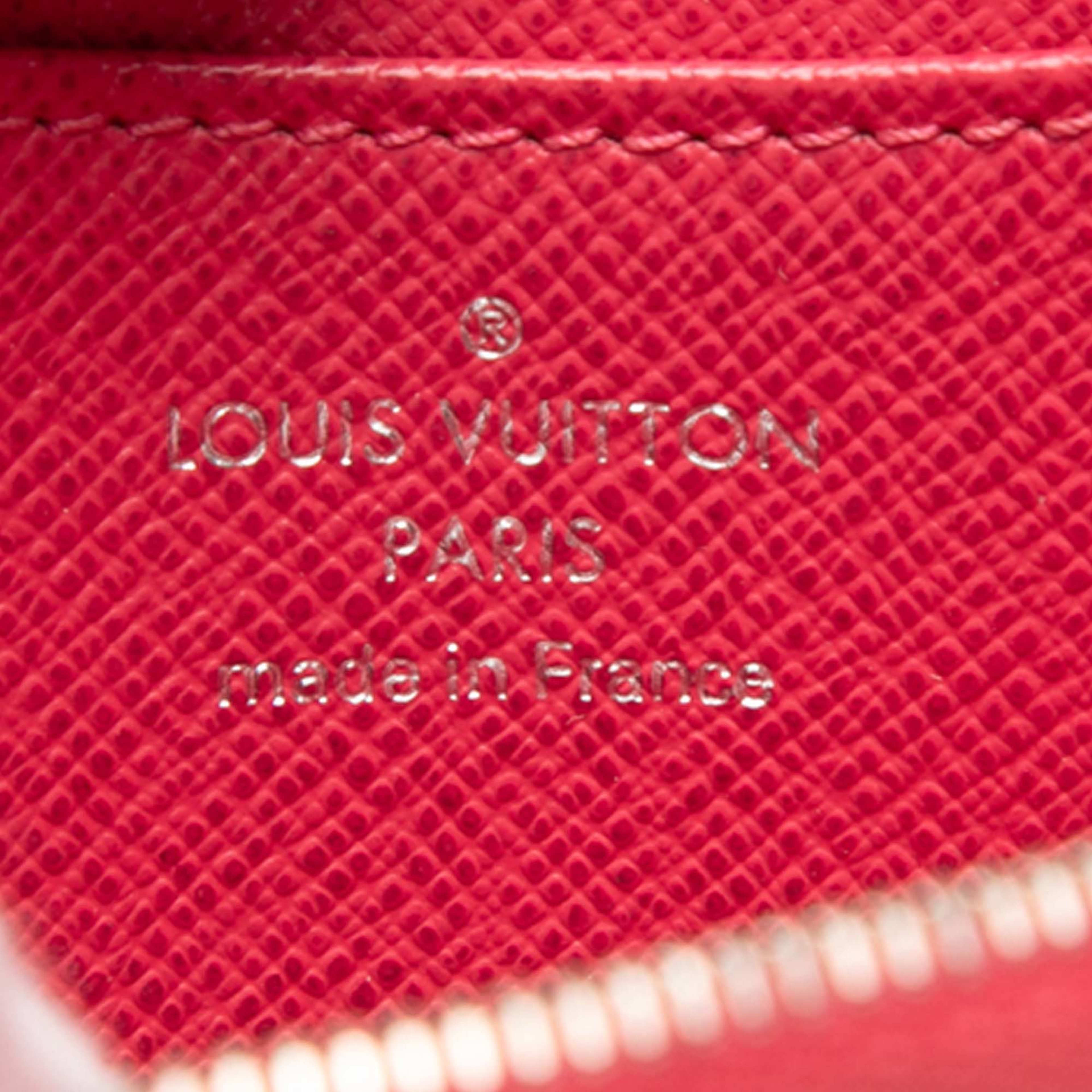 Louis Vuitton Epi Zippy Coin Purse, från Luxclusif, i färgen dark pink. Klicka för att öppna bilden i stort format