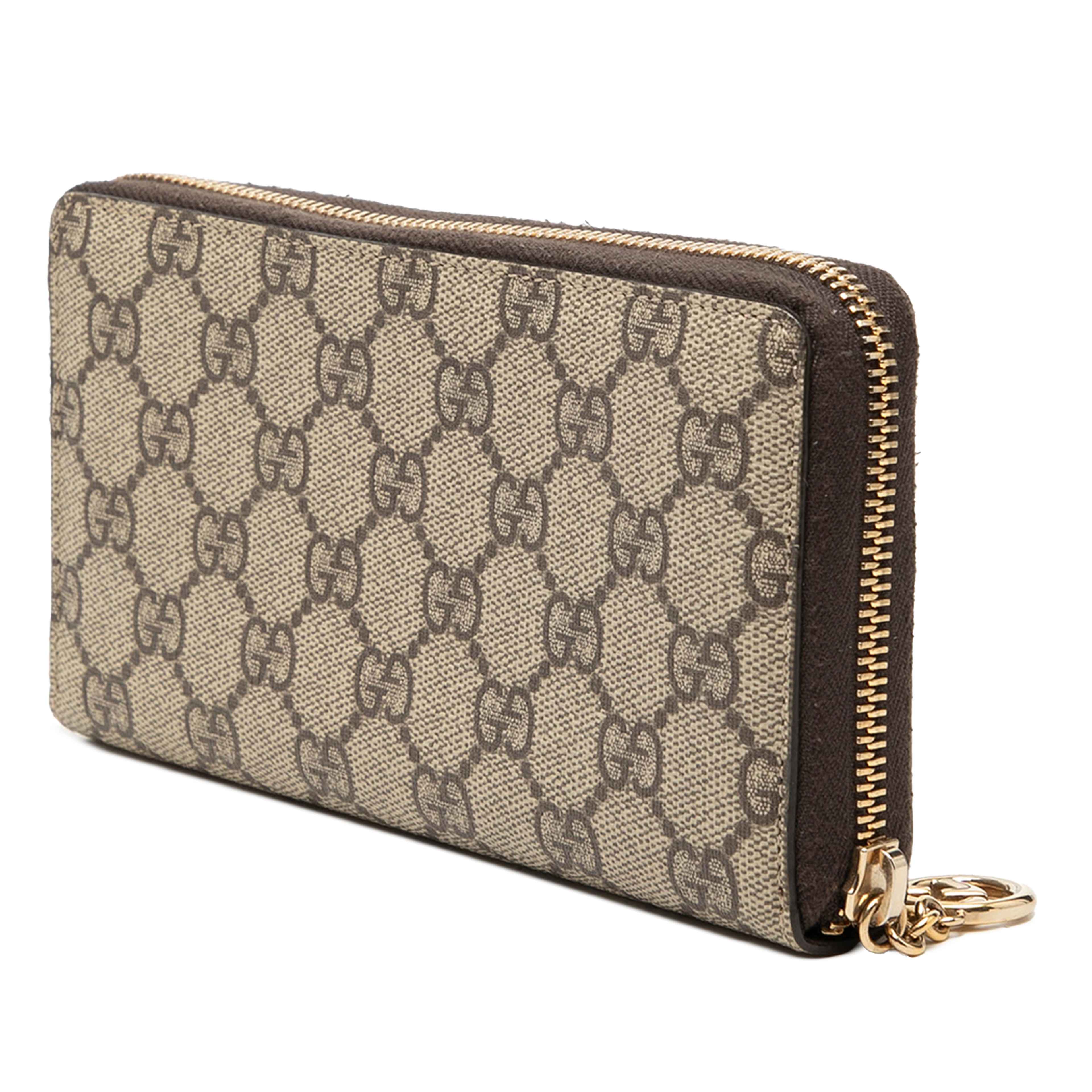 Gucci Gg Supreme Zip Around Long Wallet, från Luxclusif, i färgen beige. Klicka för att öppna bilden i stort format
