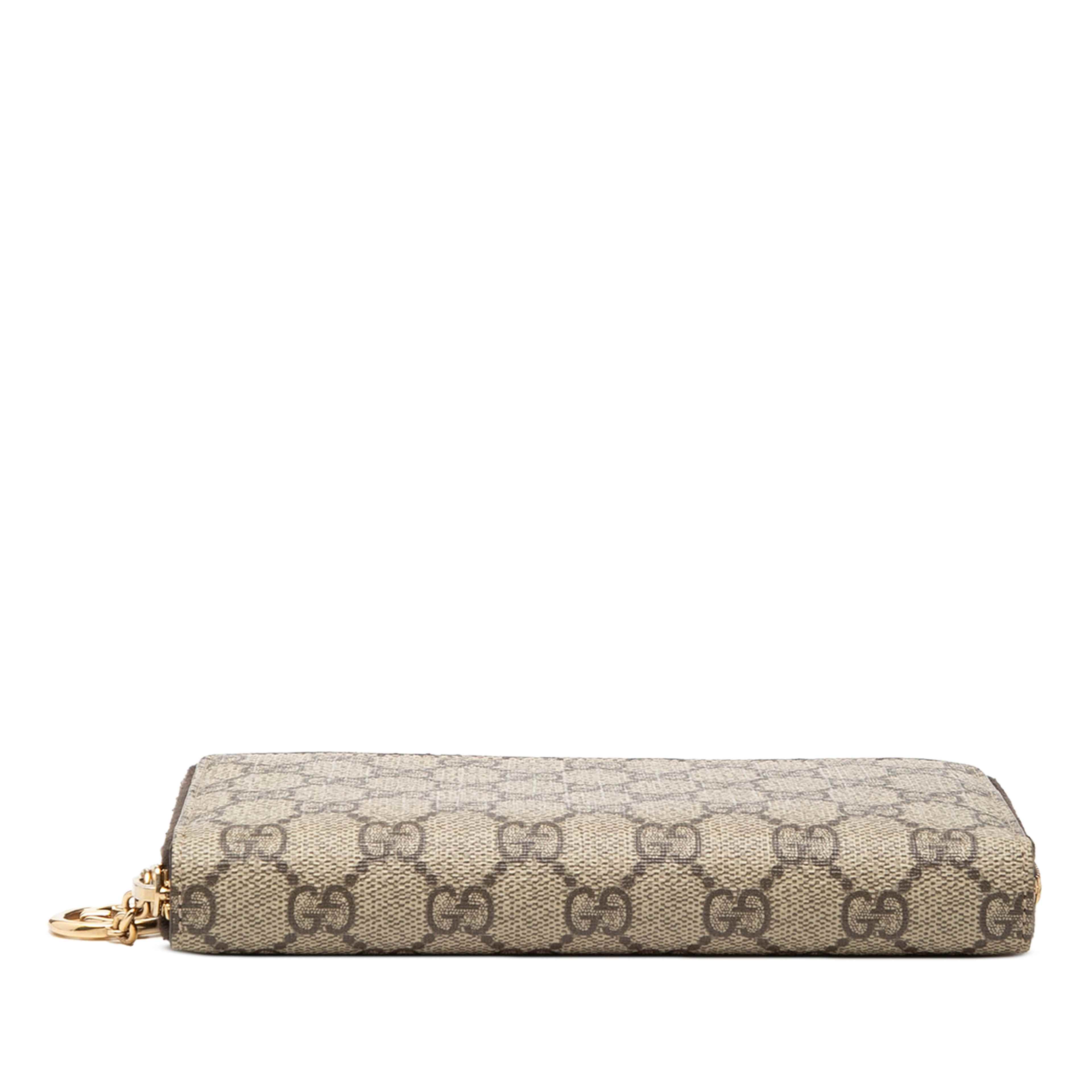 Gucci Gg Supreme Zip Around Long Wallet, från Luxclusif, i färgen beige. Klicka för att öppna bilden i stort format