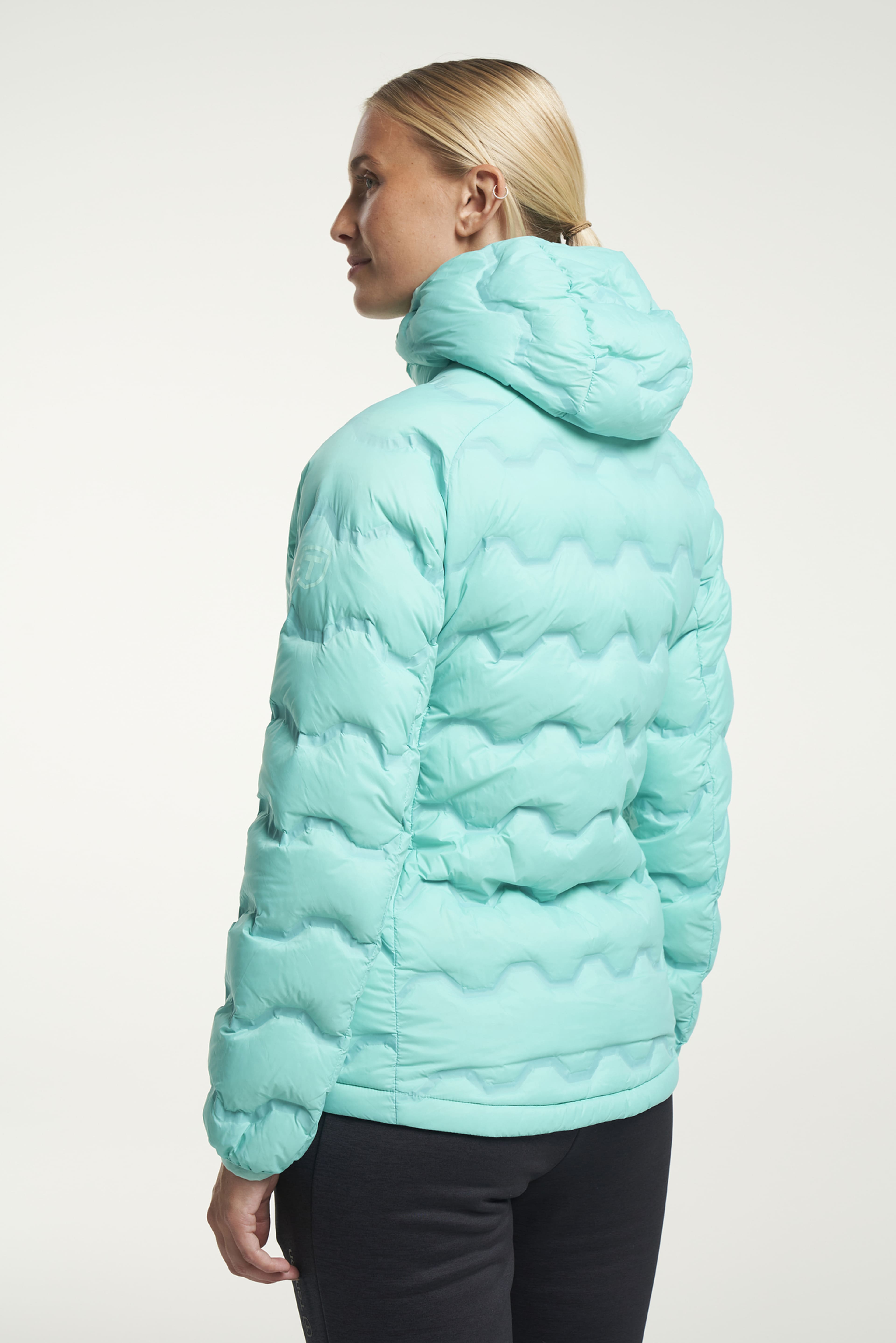 Txlite Shibui Down Jacket Women, från Tenson, i färgen ljusturkos. Klicka för att öppna bilden i stort format