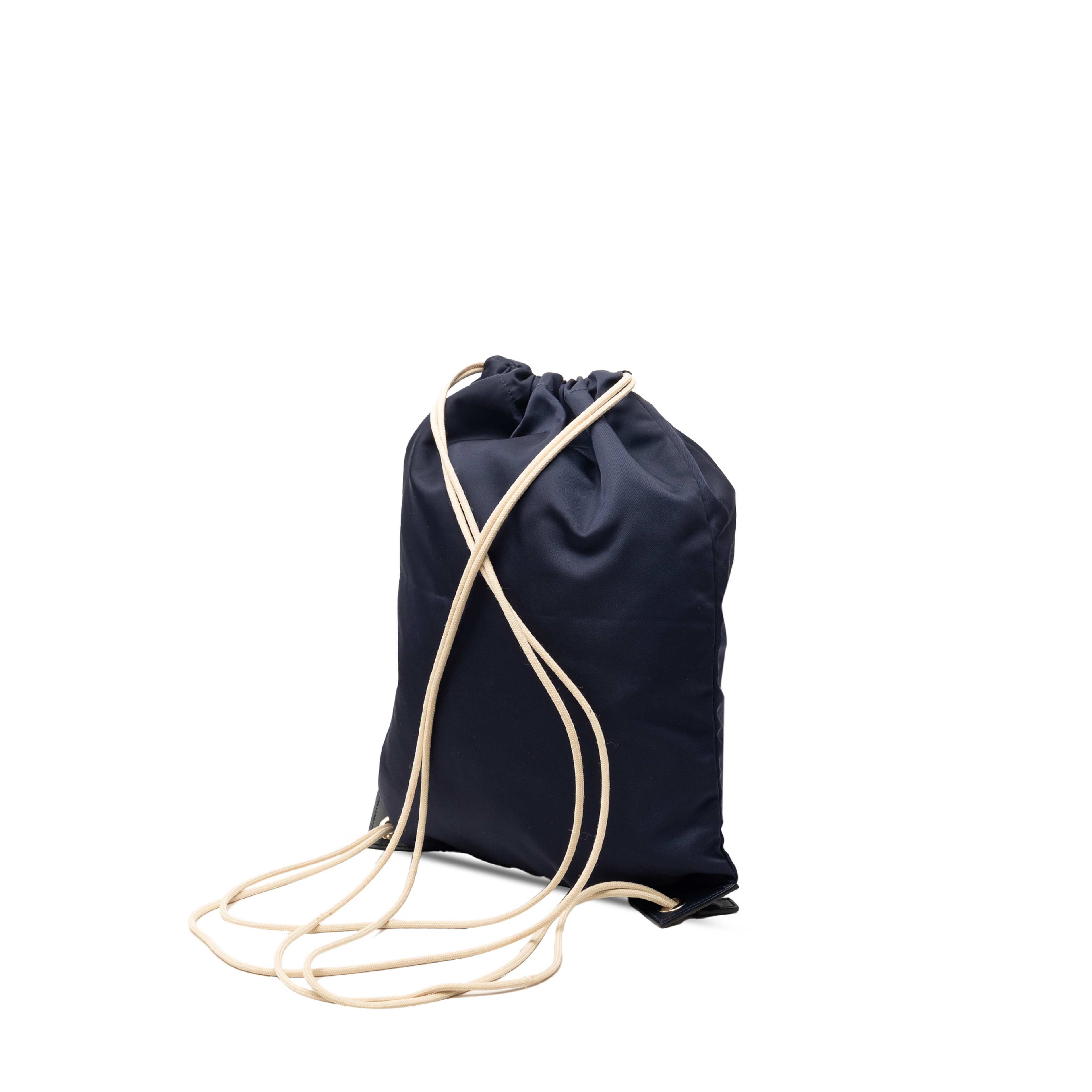 Prada Tessuto Drawstring Backpack, från Luxclusif, i färgen blå. Klicka för att öppna bilden i stort format