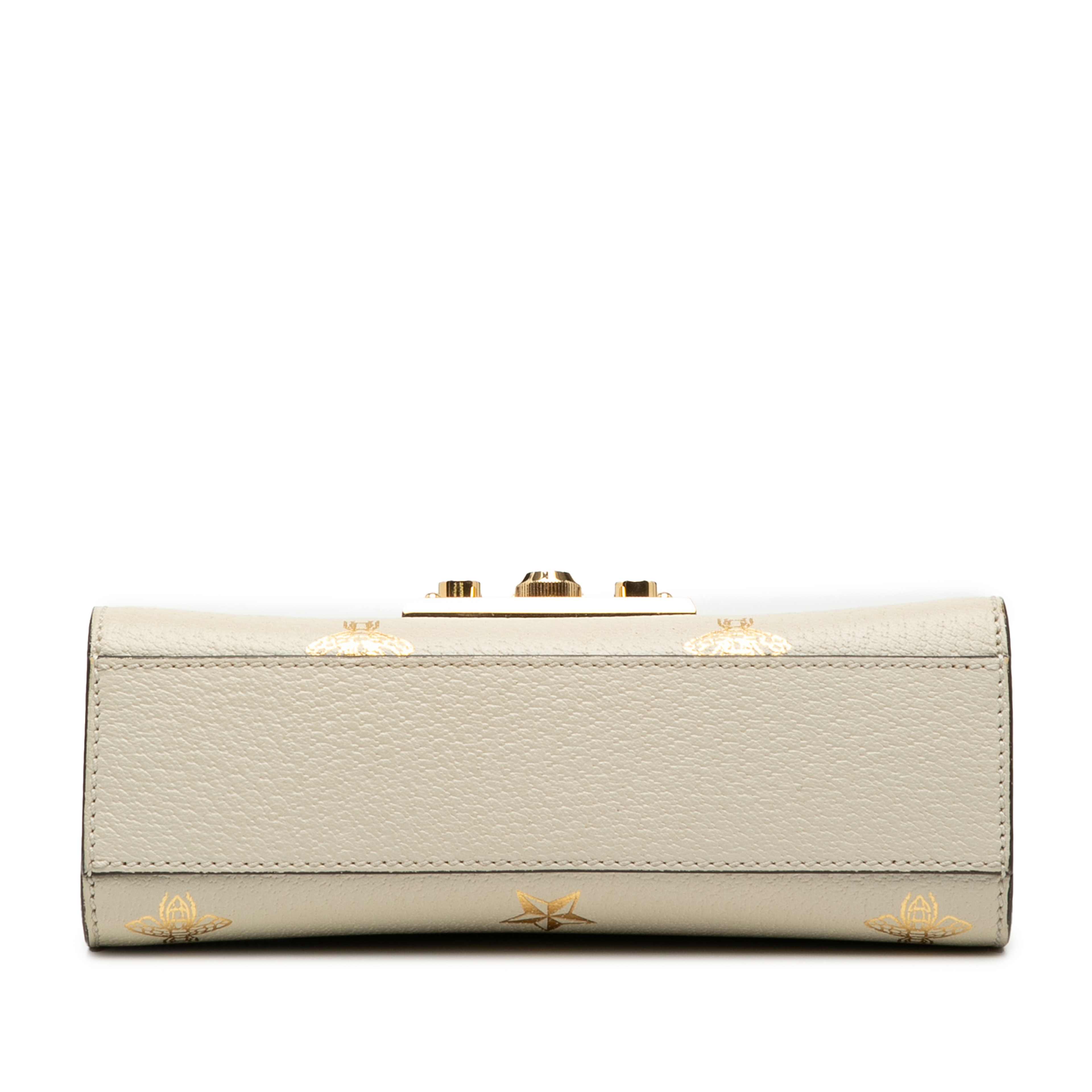 Gucci Small Leather Bee Star Padlock Crossbody, från Luxclusif, i färgen white. Klicka för att öppna bilden i stort format