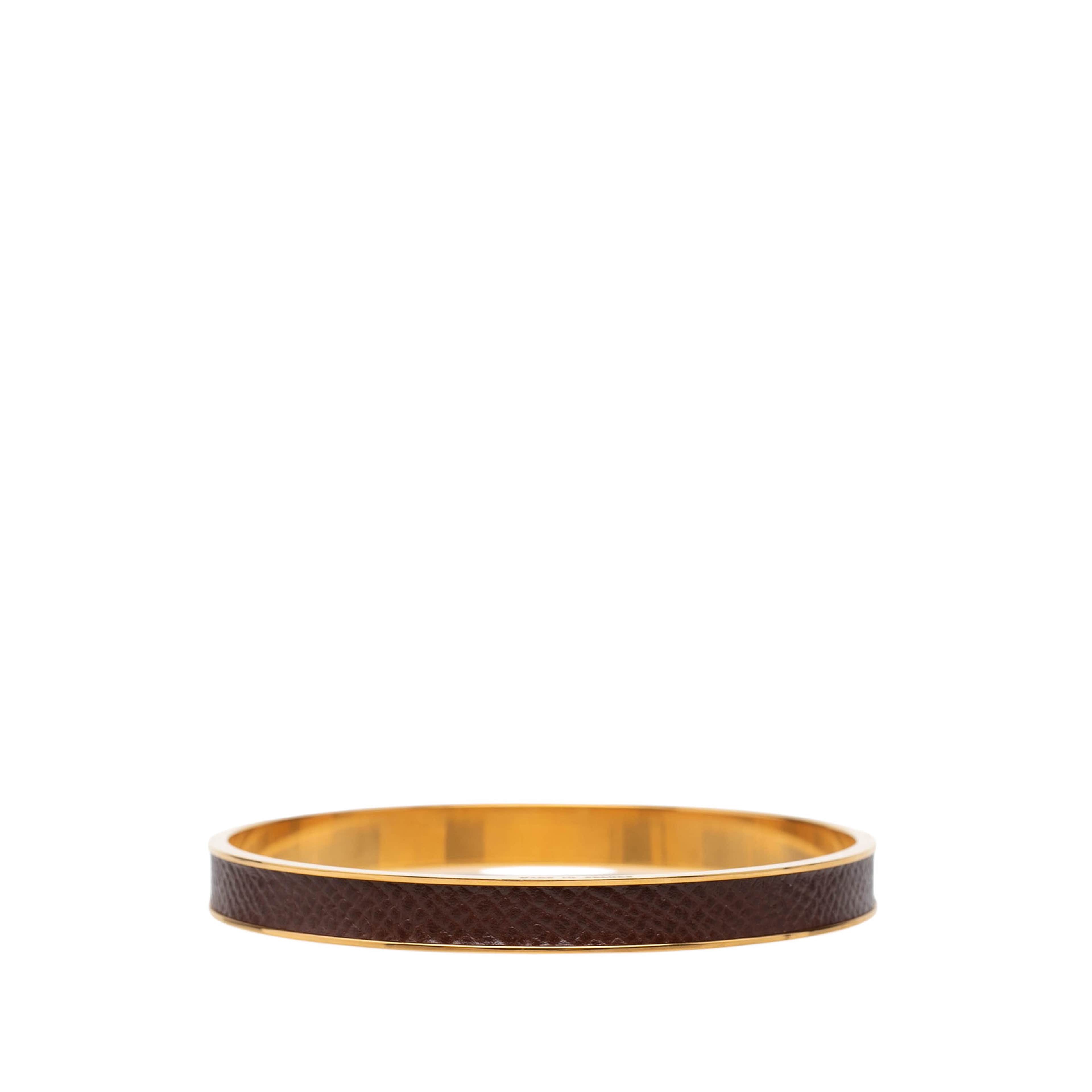Hermès Gold Plated Epsom Kelly Cadena Lock Bangle Bracelet, från Luxclusif, i färgen brun. Klicka för att öppna bilden i stort format