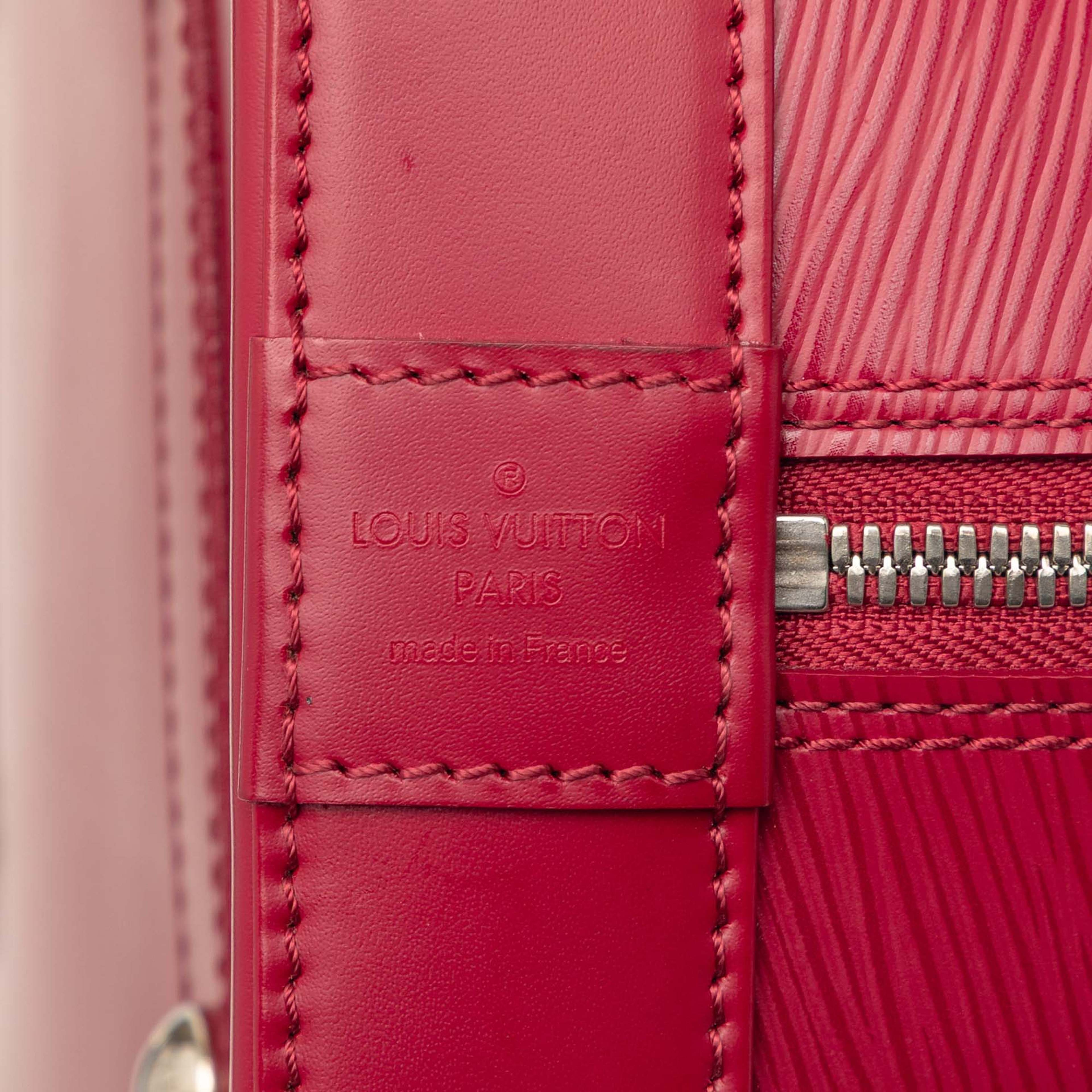 Louis Vuitton Epi Alma Gm, från Luxclusif, i färgen red. Klicka för att öppna bilden i stort format