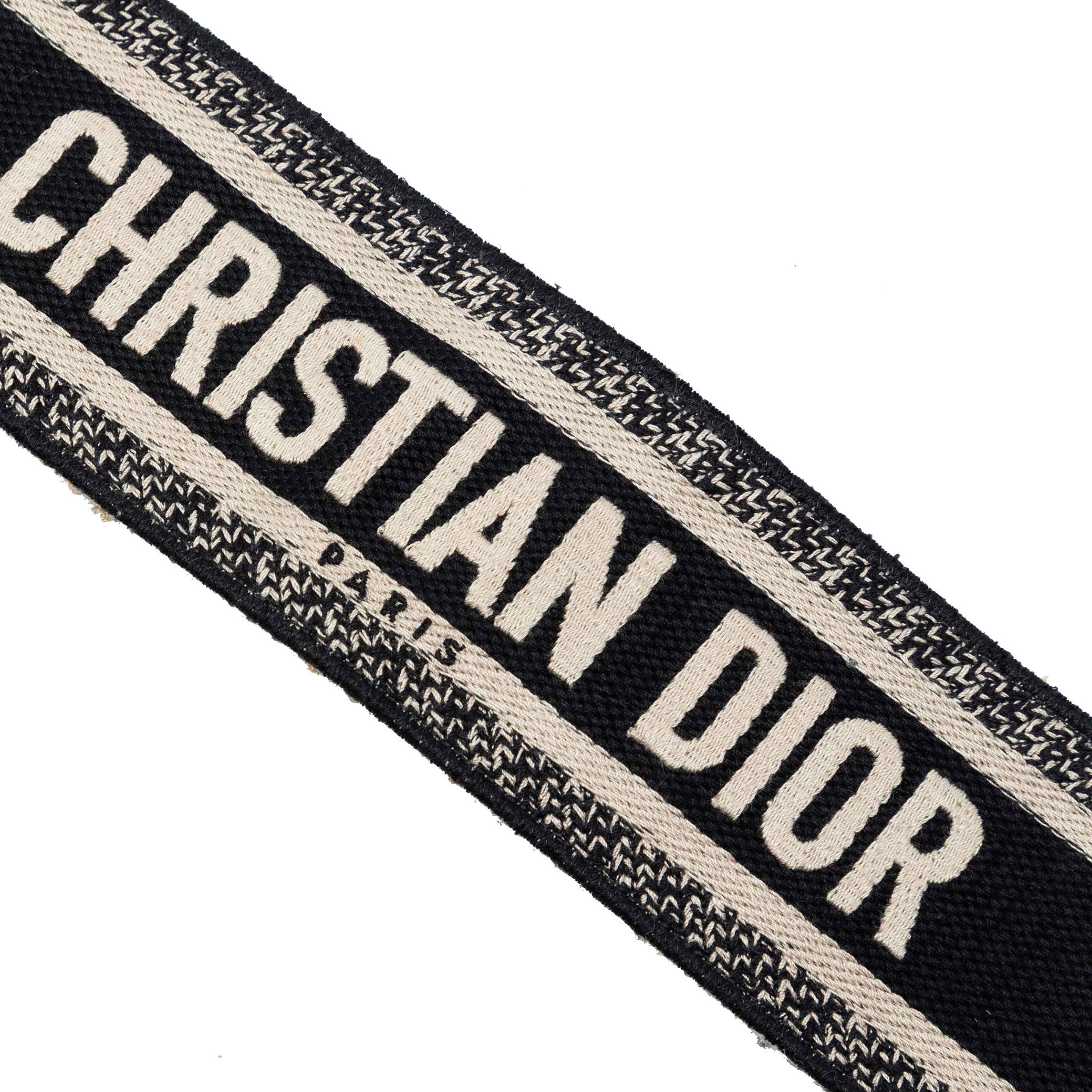 Dior Canvas Logo Embroidered Shoulder Strap, från Luxclusif, i färgen black. Klicka för att öppna bilden i stort format
