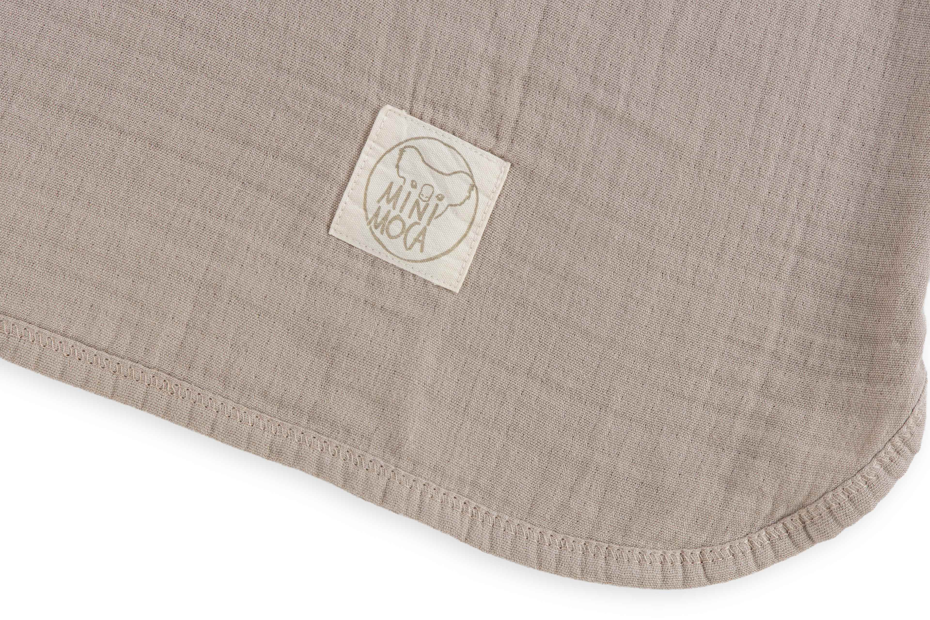 Muslin Poncho, från Minimoca, i färgen beige. Klicka för att öppna bilden i stort format