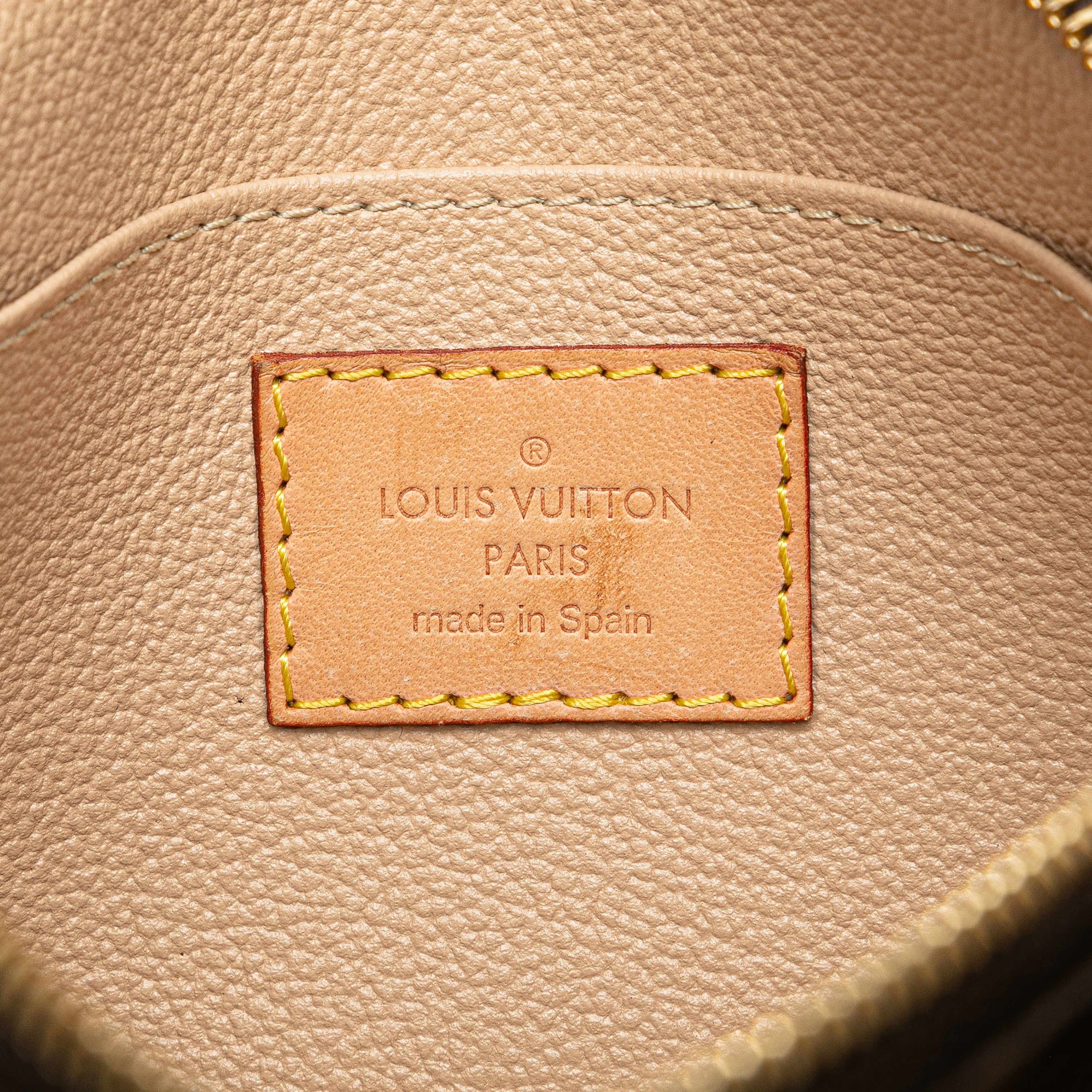 Louis Vuitton Monogram Cosmetic Pouch, från Luxclusif, i färgen brown. Klicka för att öppna bilden i stort format
