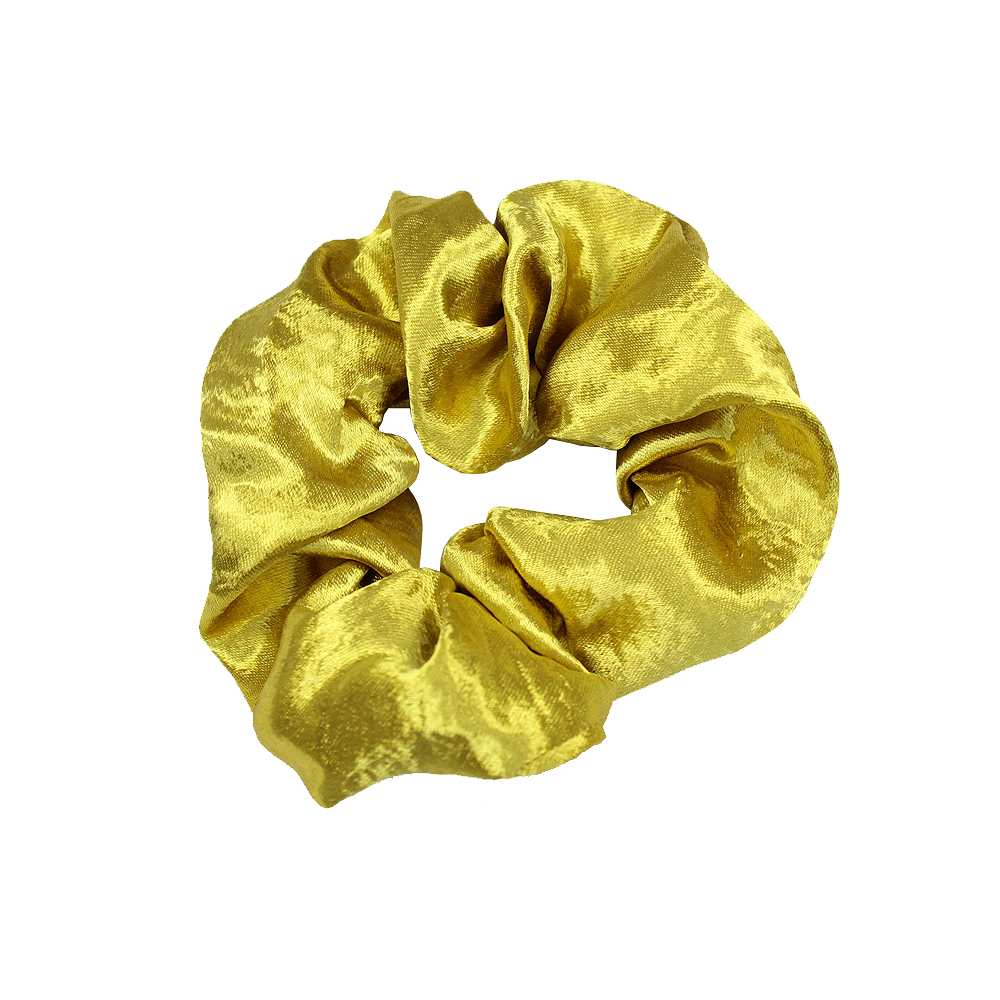 Hårscrunchies i sidemimitation, från Complement, i färgen mustard.
