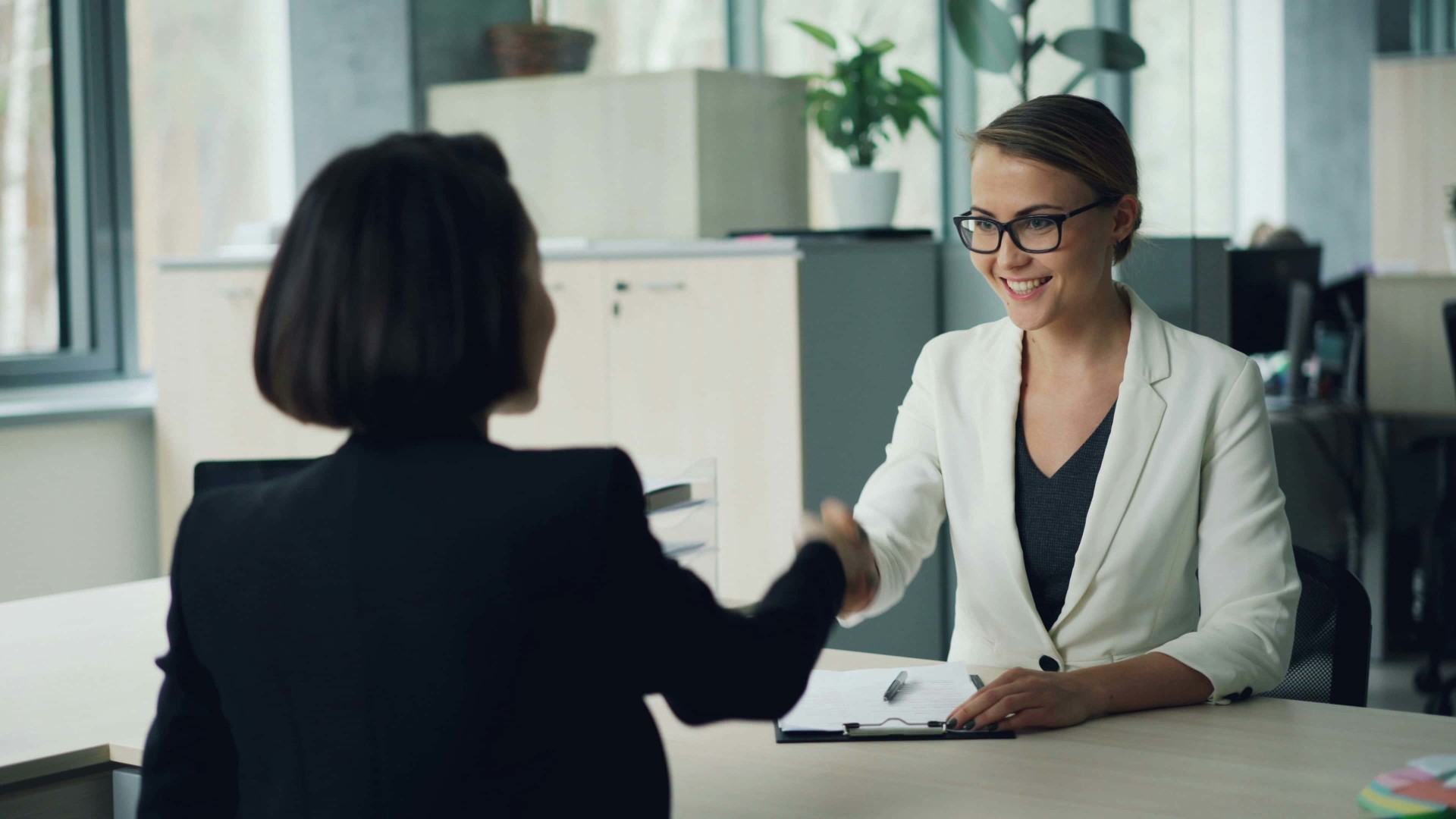 Procurement professional analyzing supplier data and analytics