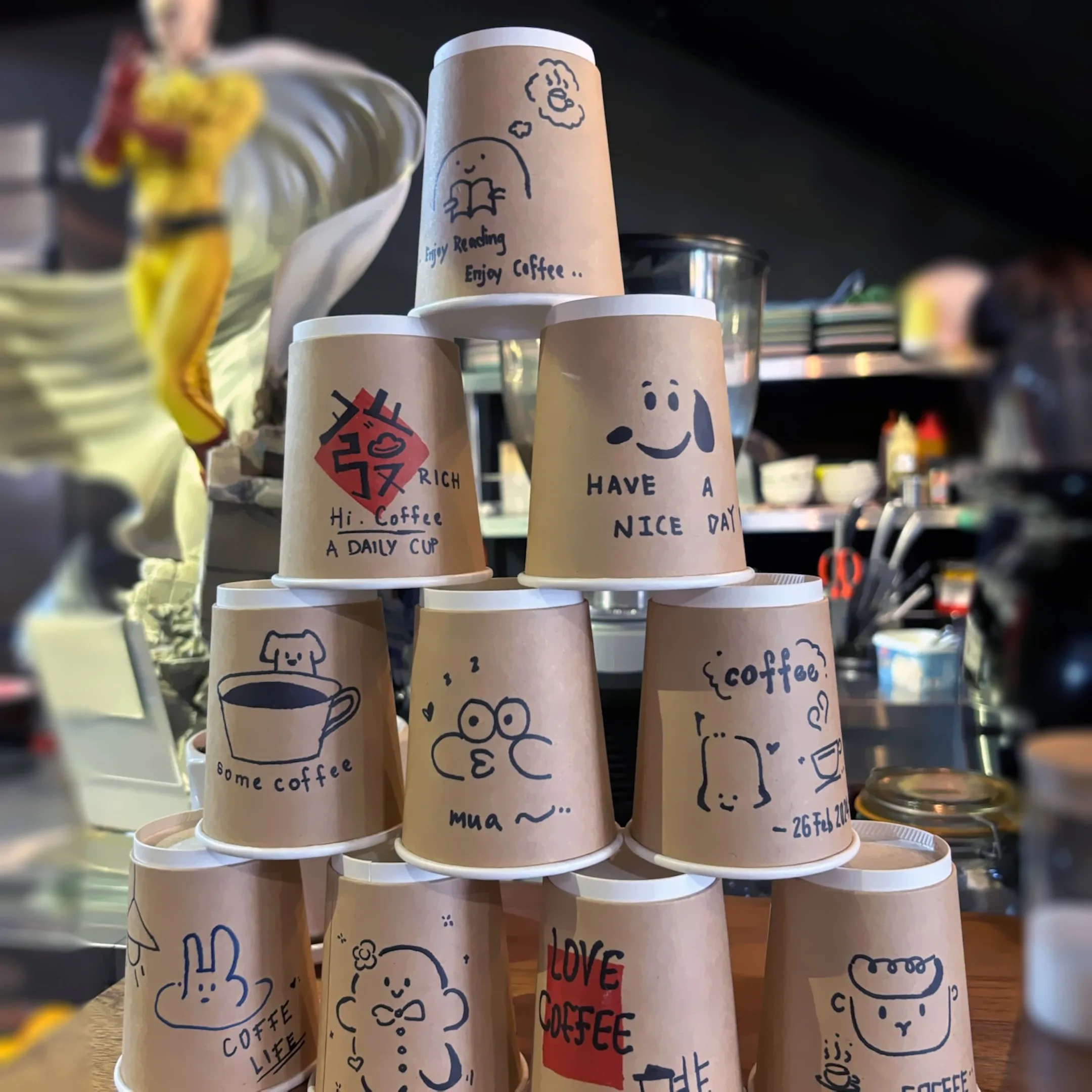 A stack of cups with stickers on them.