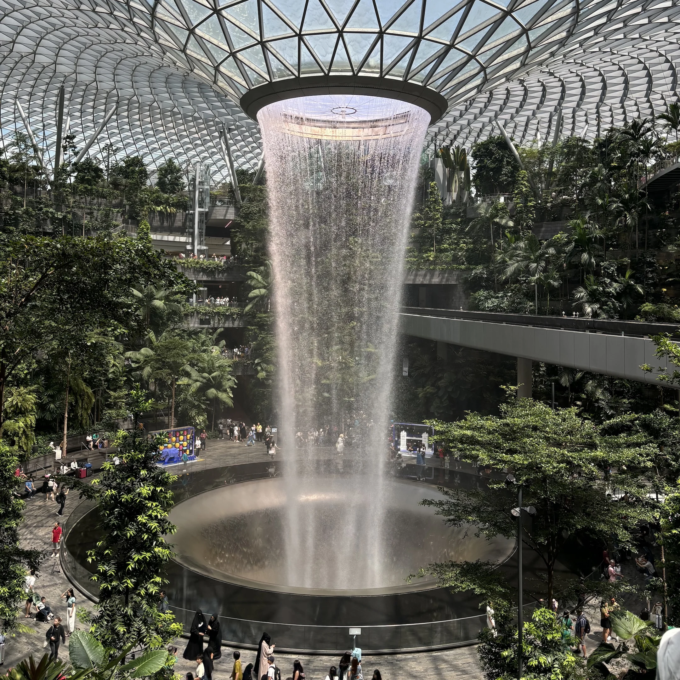 A large fountain in a large building.