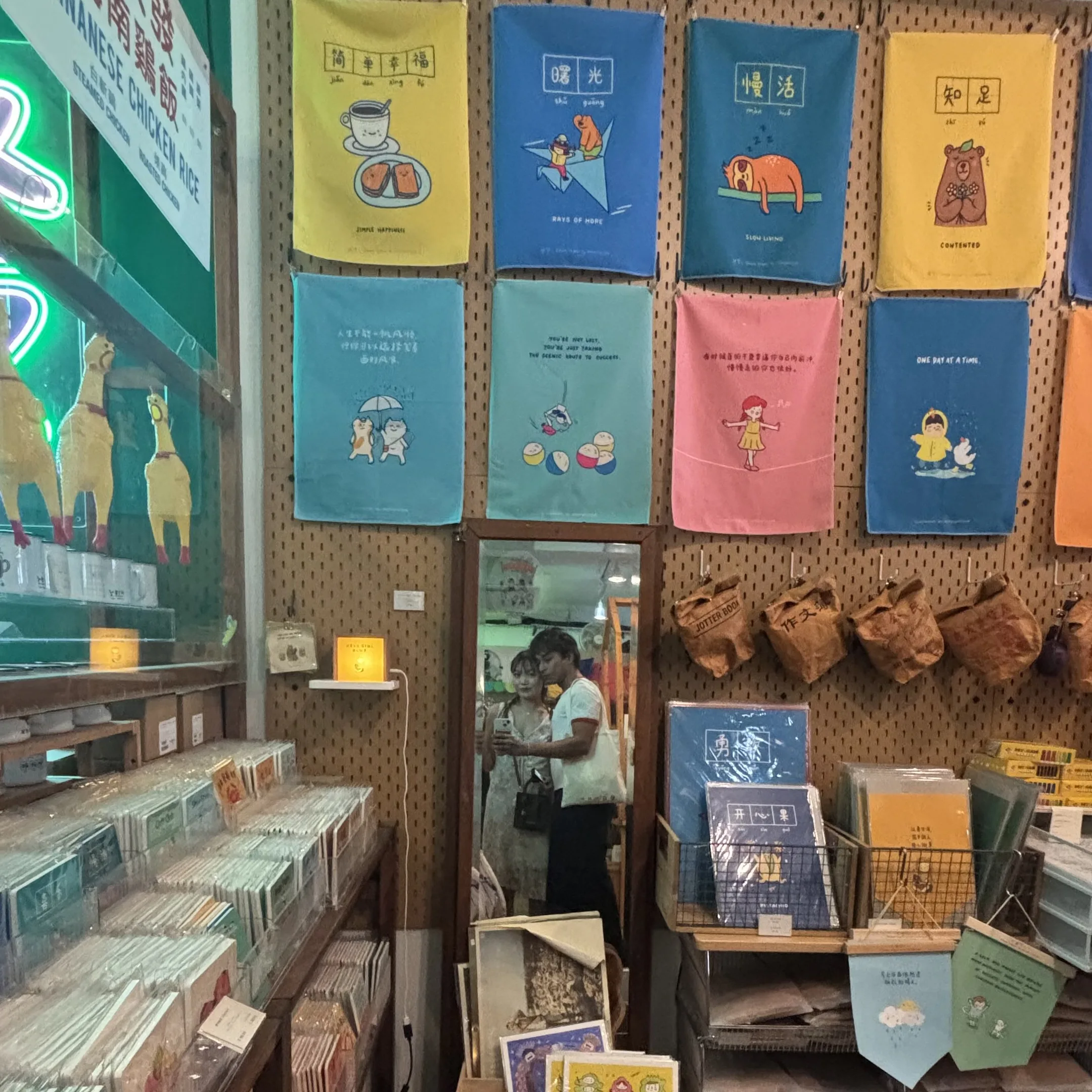 A room with a bunch of books on the wall.