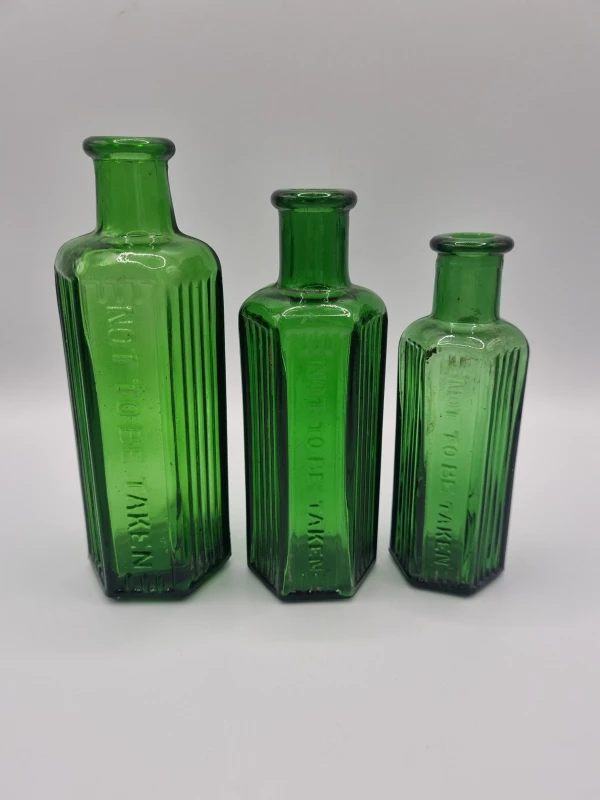 3 Green Poison Bottles
