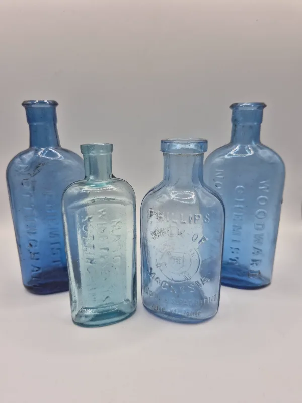4 Blue Chemist Bottles