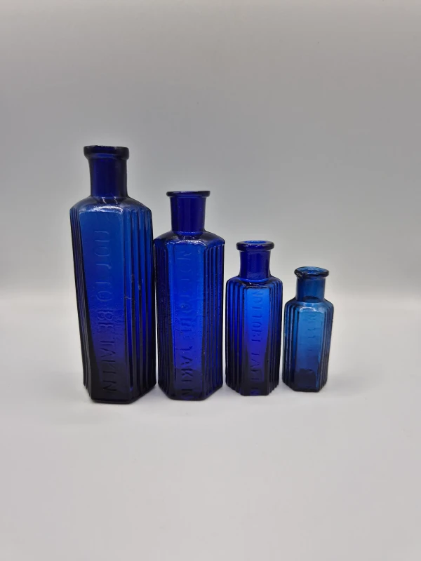 4 Blue Poison Bottles