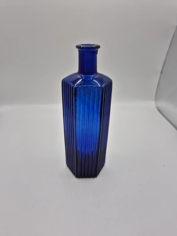 1880s Blue Rolled Lip Poison Bottle