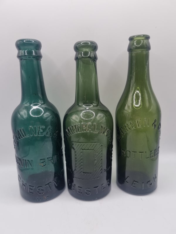 3 Embossed Old English Beer Bottles